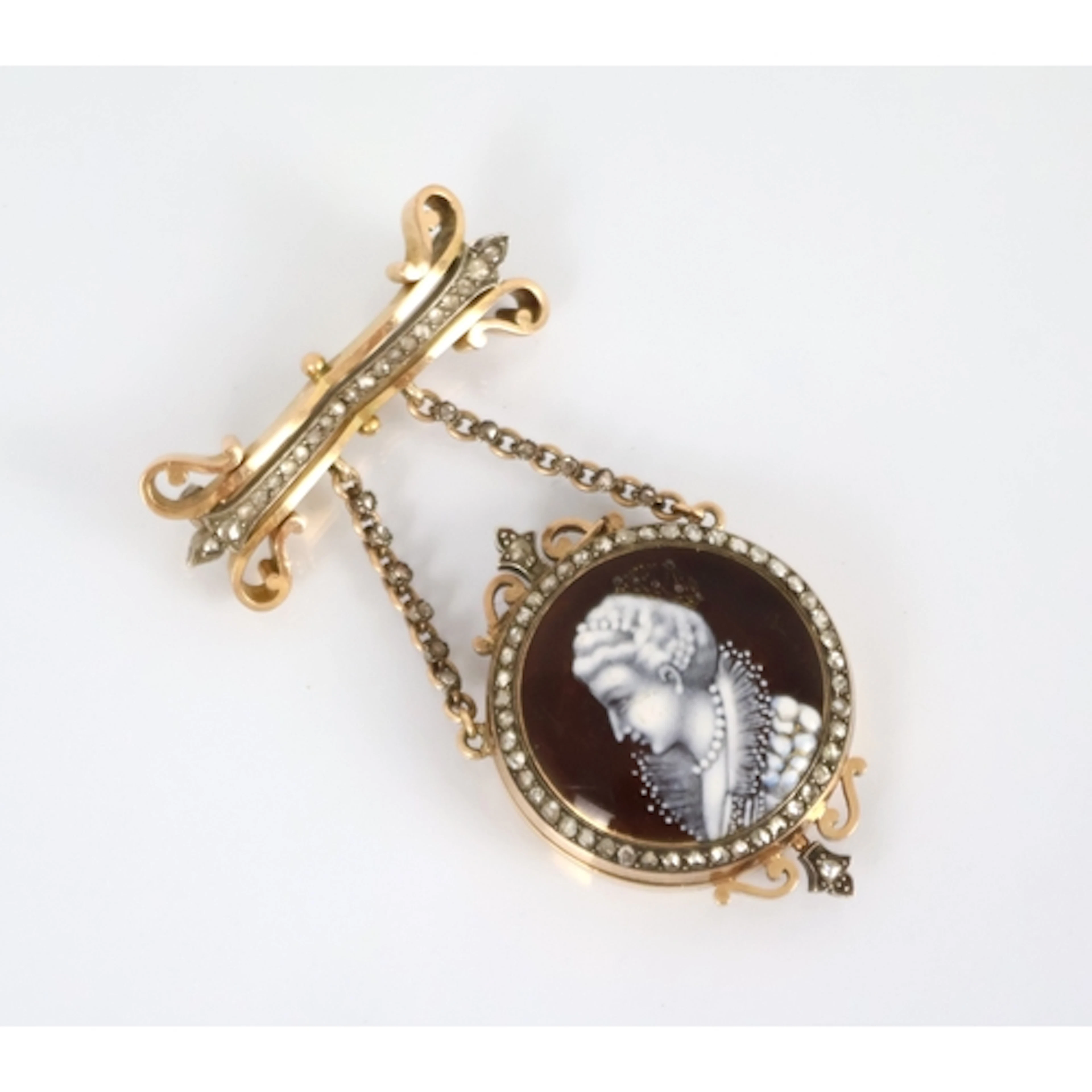 An unusual diamond set and enamel ladies yellow metal fob wa...