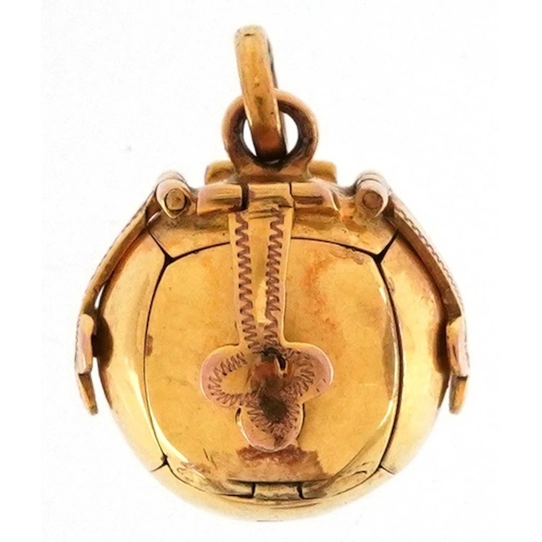 Masonic 9ct gold cased silver folding ball charm, 3.5cm high...