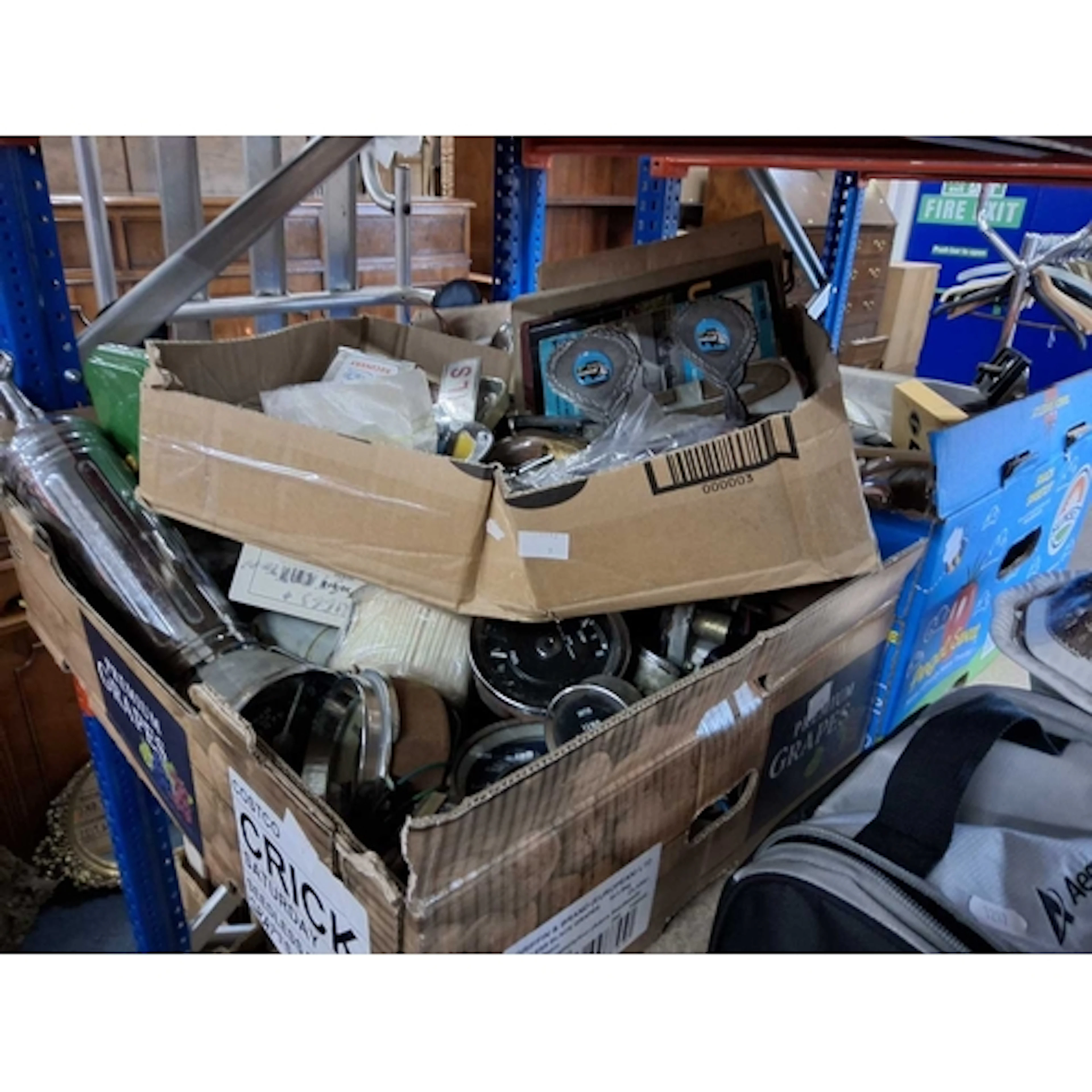 THREE BOXES OF VINTAGE CAR PARTS to include speedometers, ot...