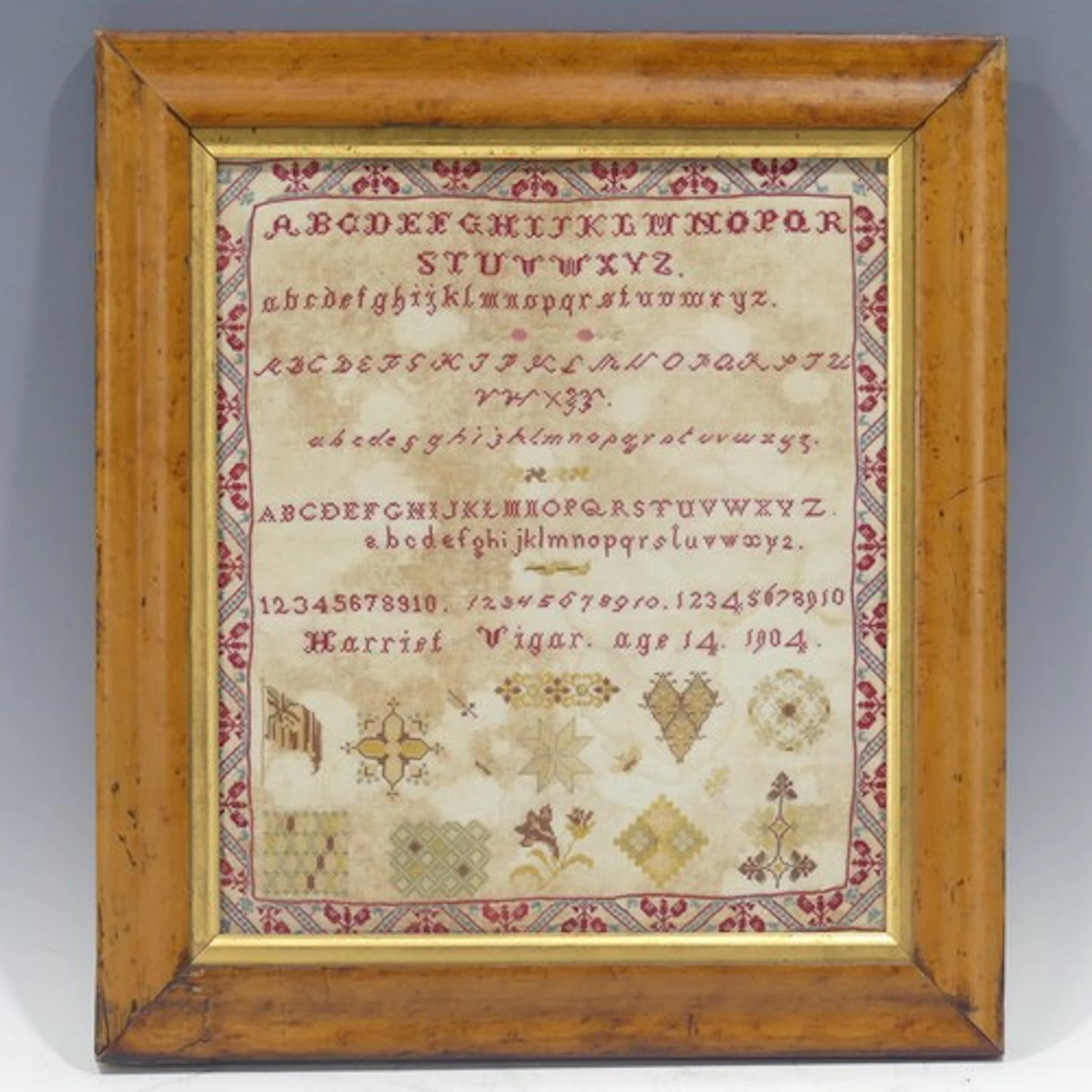 An early 20th century needlework alphabet and number Sampler...