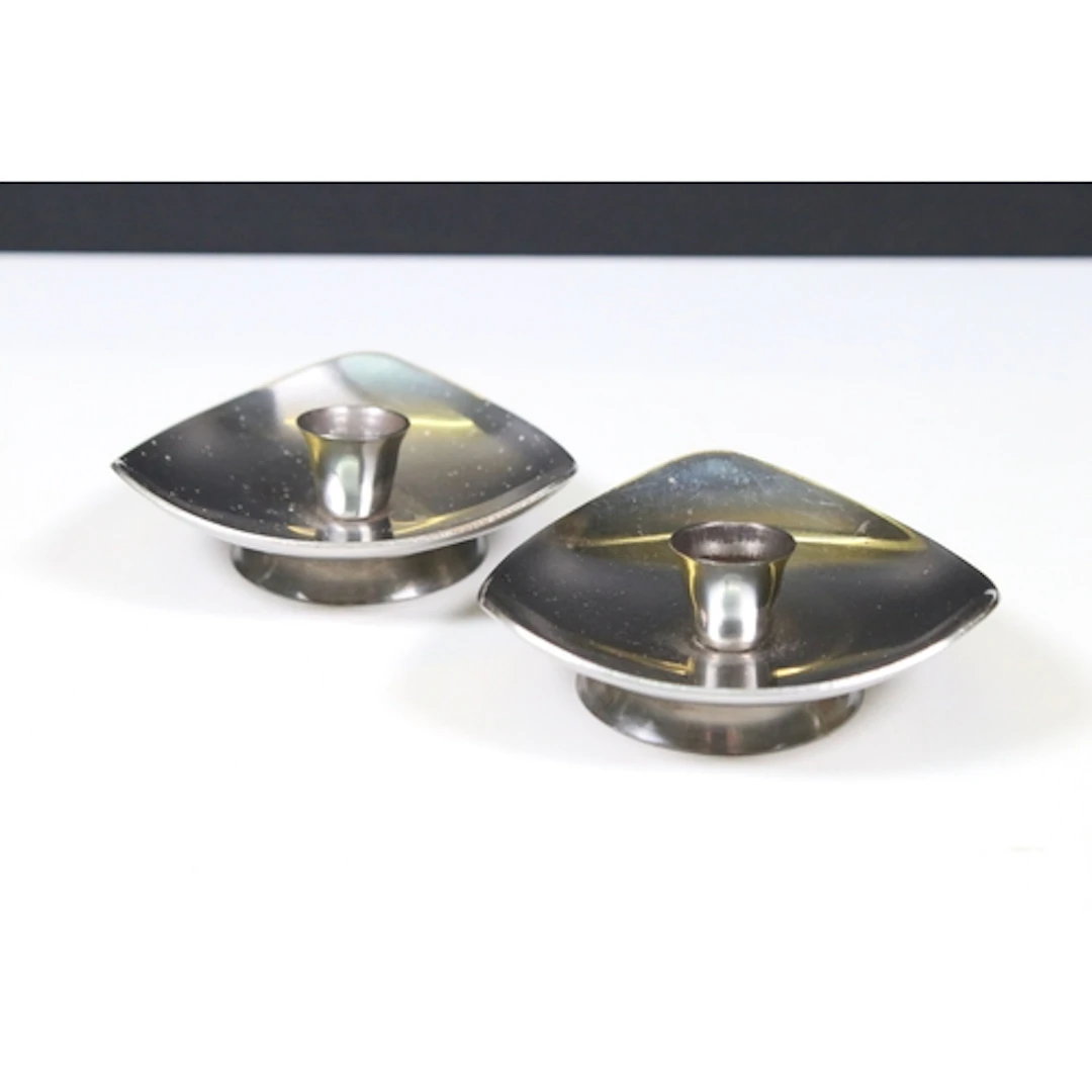 Pair of Mid-century Danish Stelton stainless steel candlesti...