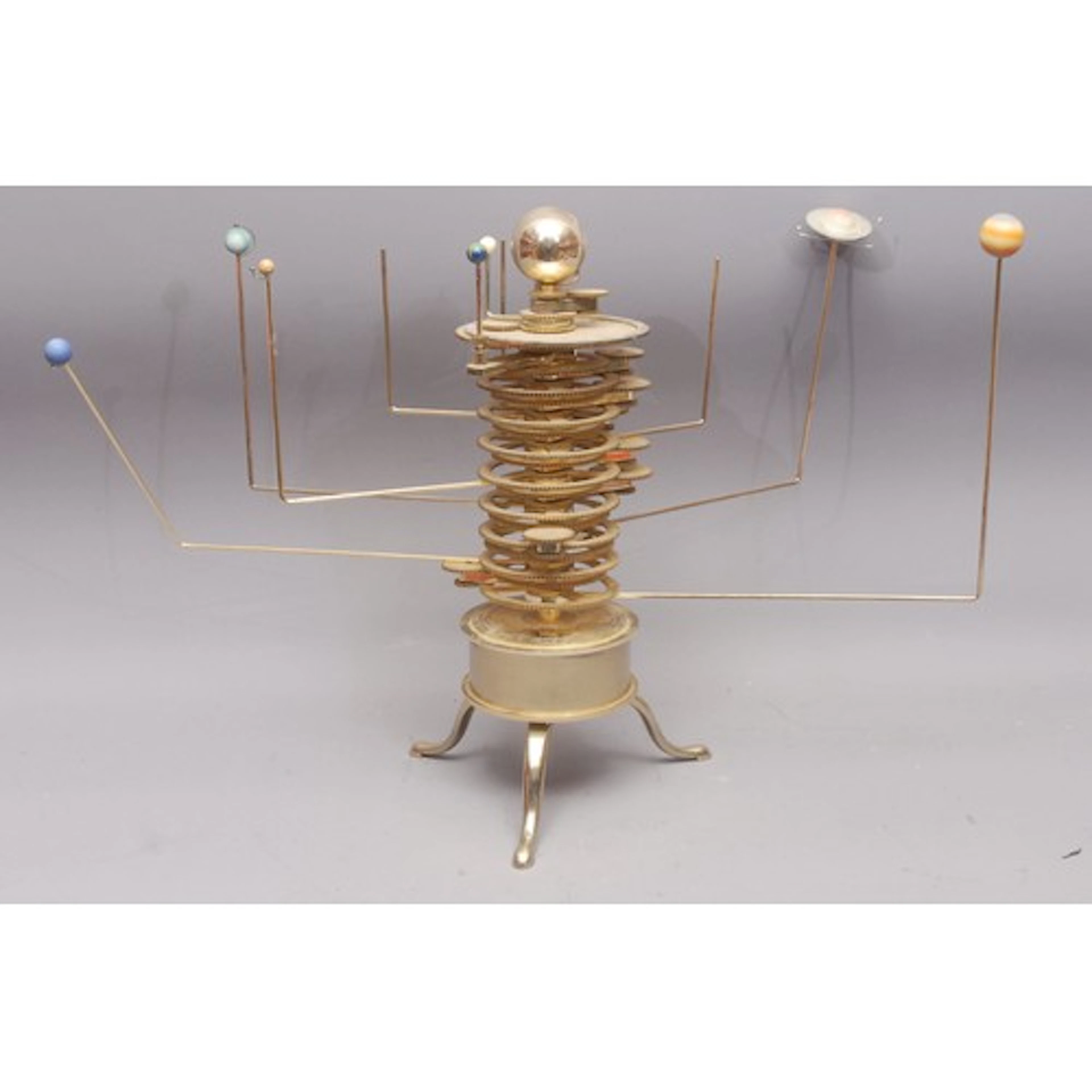 Scientific Instruments - a brass heliocentric orrery, depict...