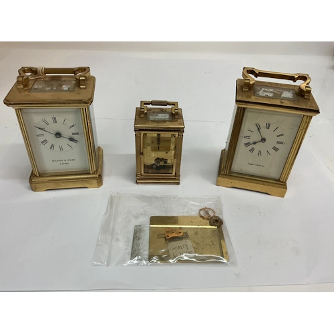 Two Mappin & Webb brass carriage clocks plus another sma...