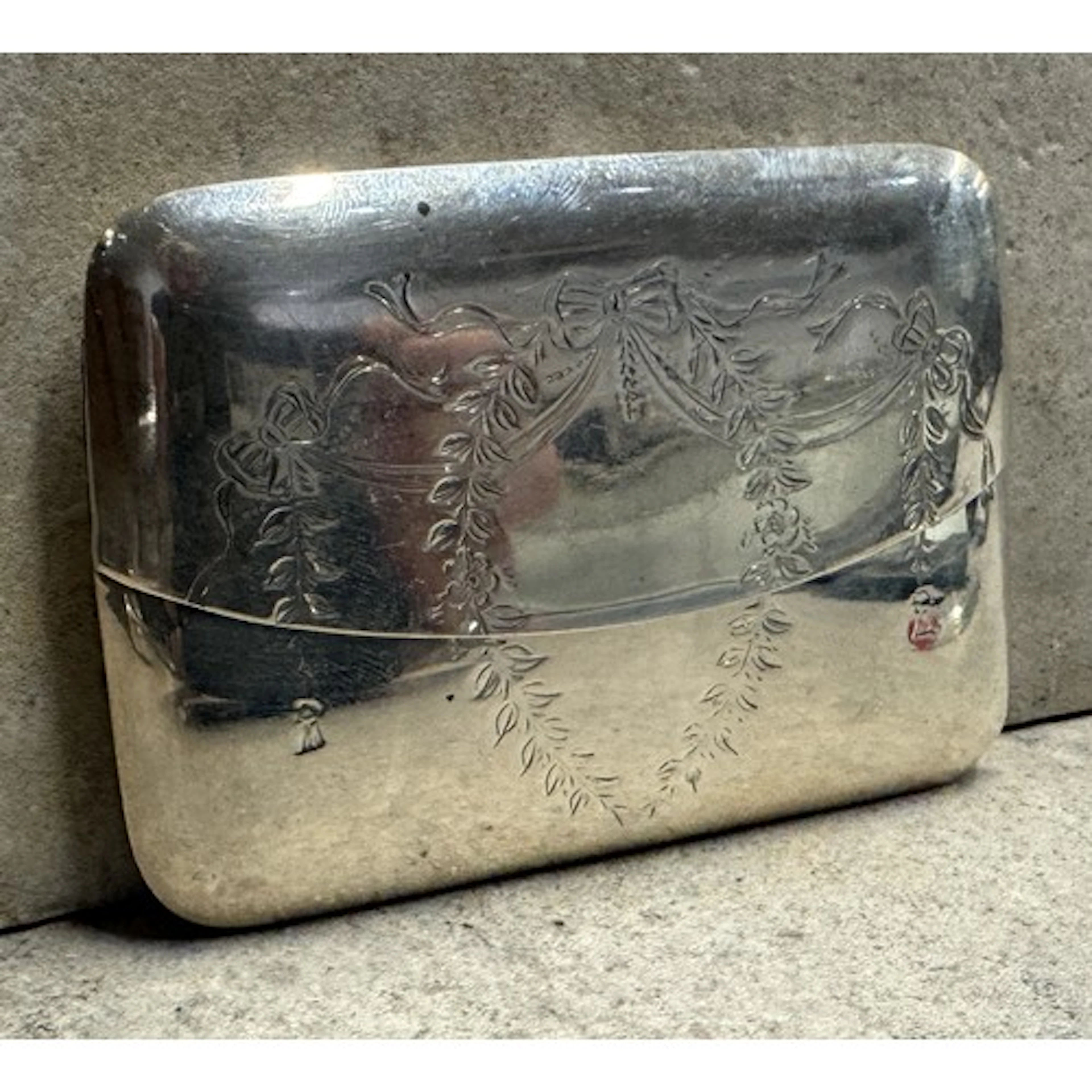 A silver card case in the form of an envelope. Birmingham 19...