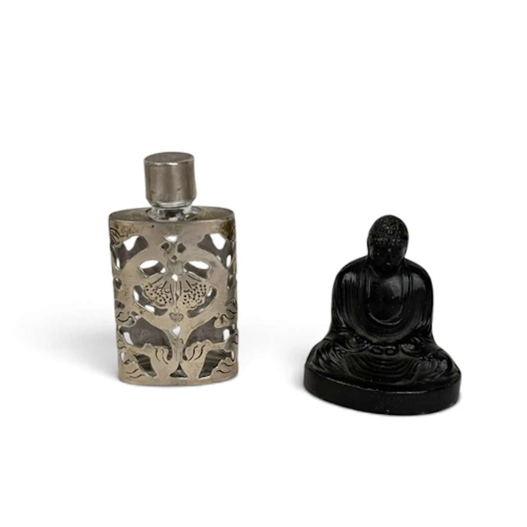 A SILVER MOUNTED SCENT BOTTLE TOGETHER WITH A CHINESE BUDDHA...