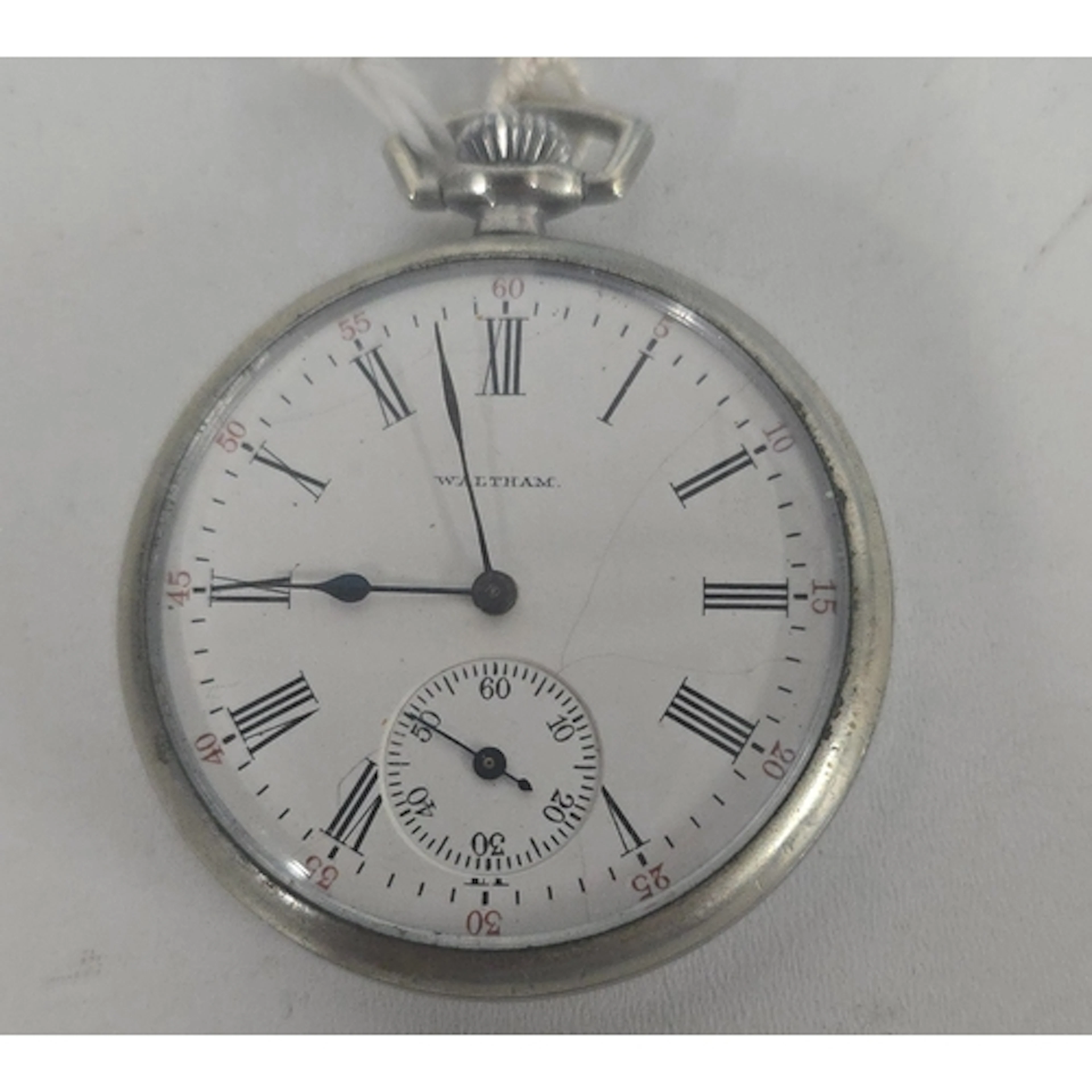 An small American pocket watch by A.W..W.Co., Waltham Mass.,...