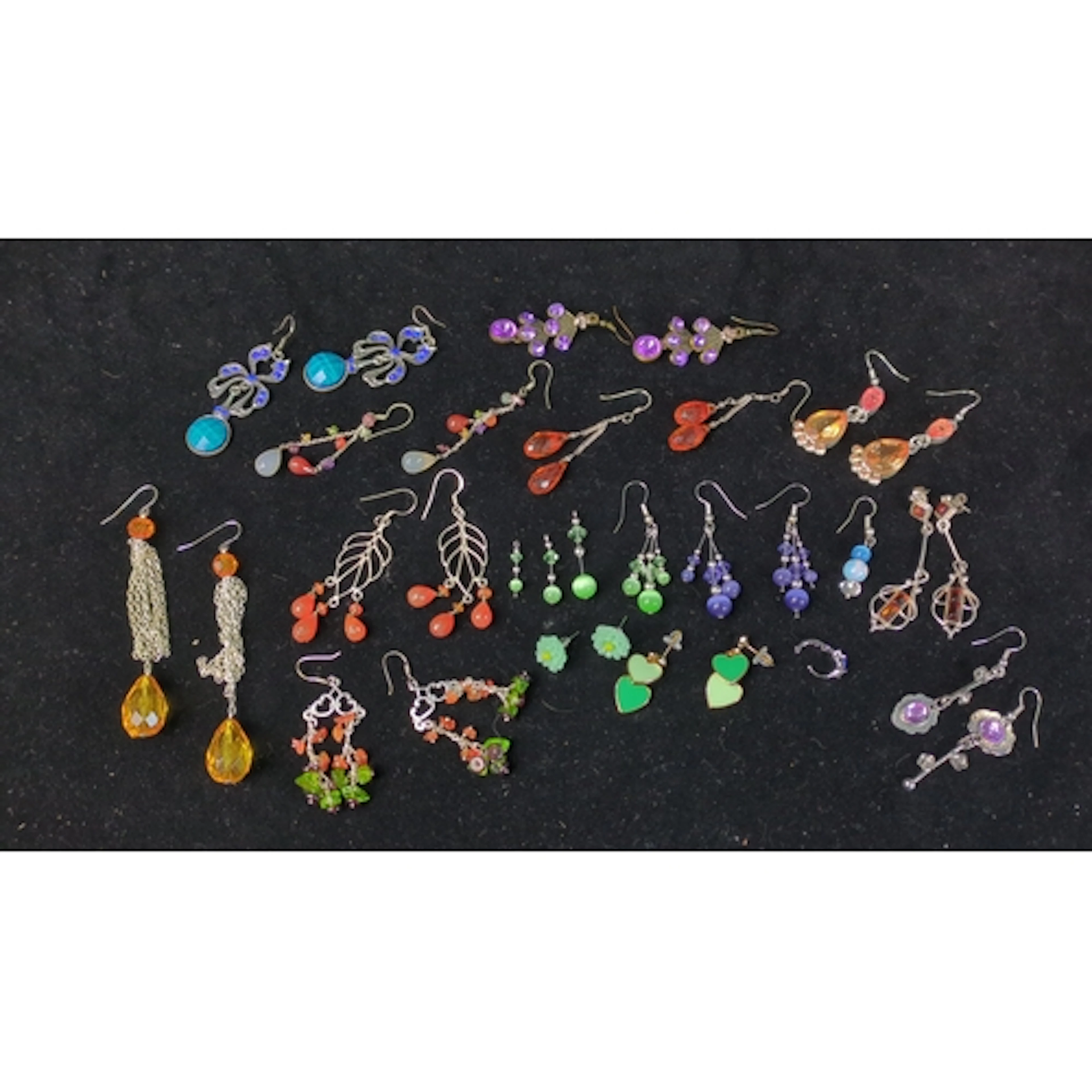 A quantity of earrings, chiefly pairs, in silver- and gold-t...