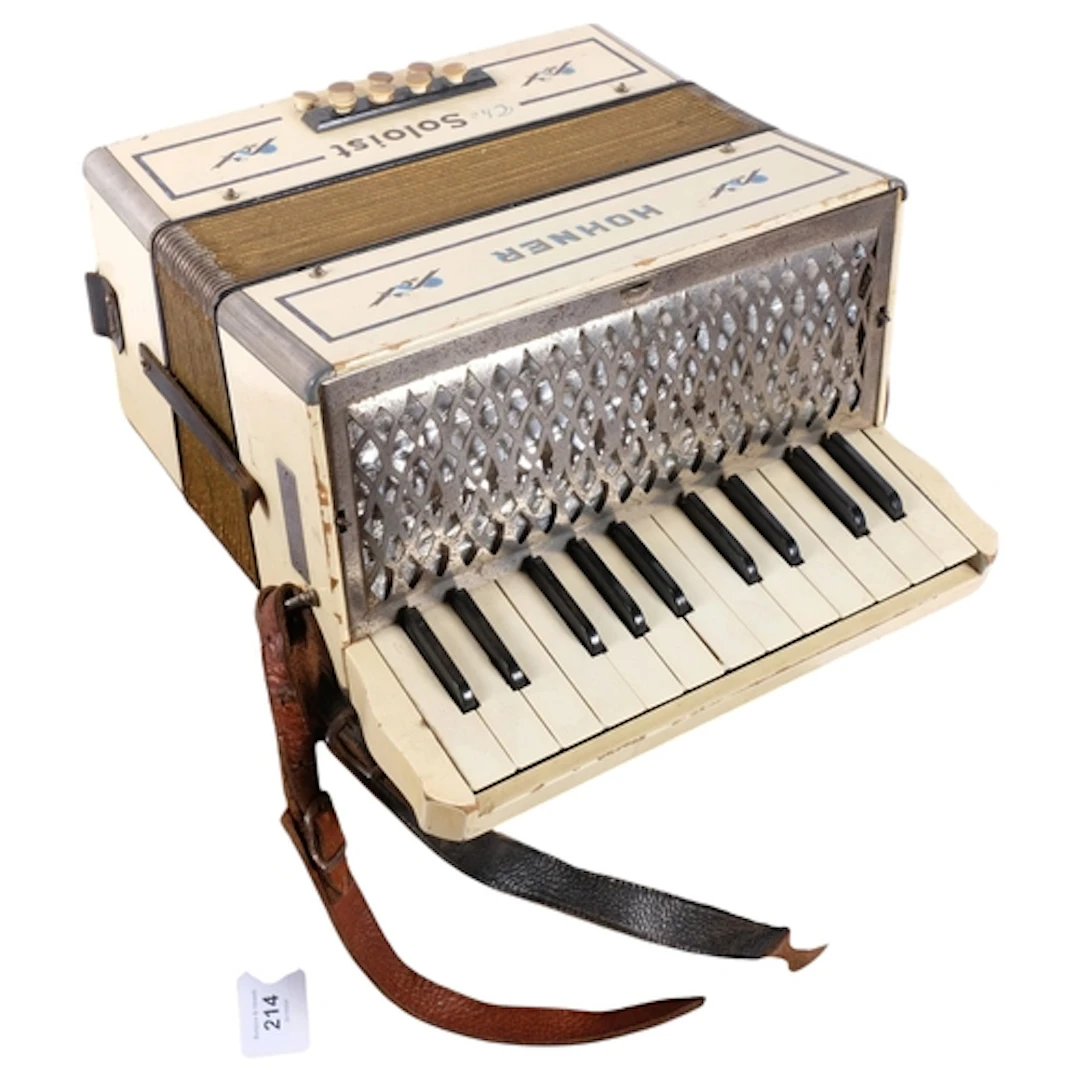 A Hohner Soloist harmonium, cased