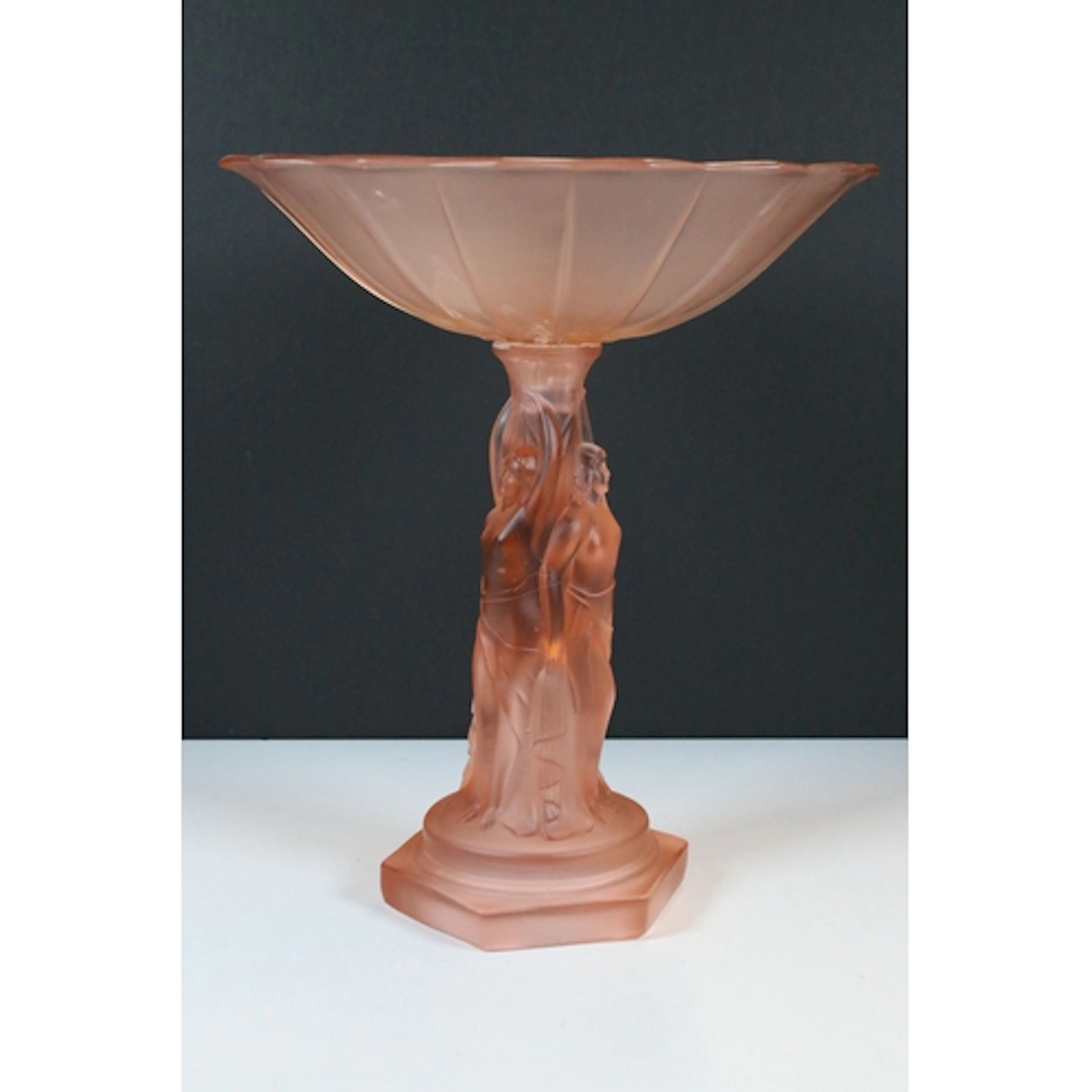 Art Deco frosted pink glass figural tazza, the bowl resting ...