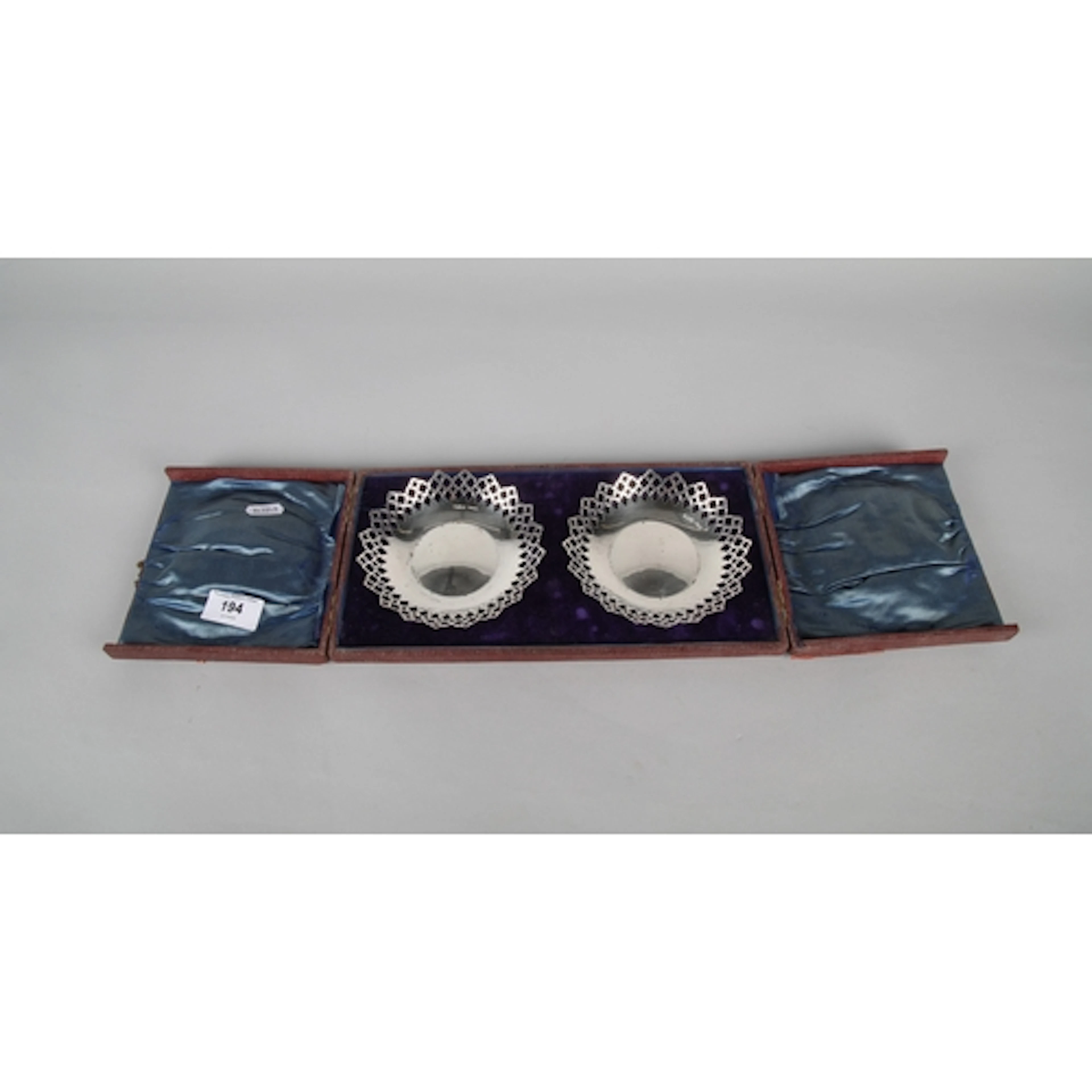 Two silver Pierced bon bon dishes in fitted case, Chester 19...