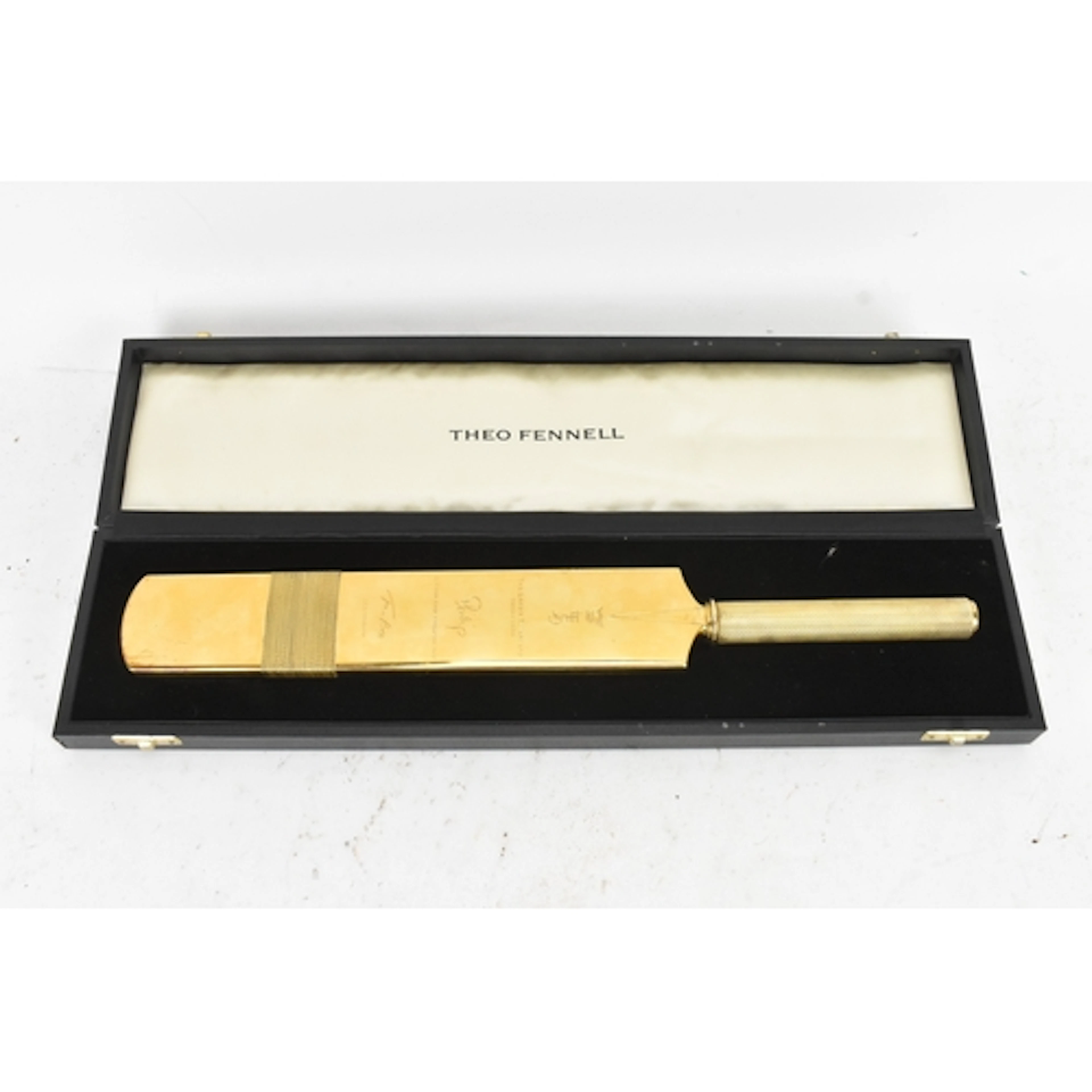 A modern silver gilt presentation cricket bat by Theo Fennel...