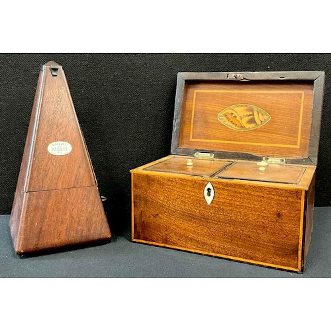 A Regency mahogany tea caddy, Tunbridge ware banding to hing...