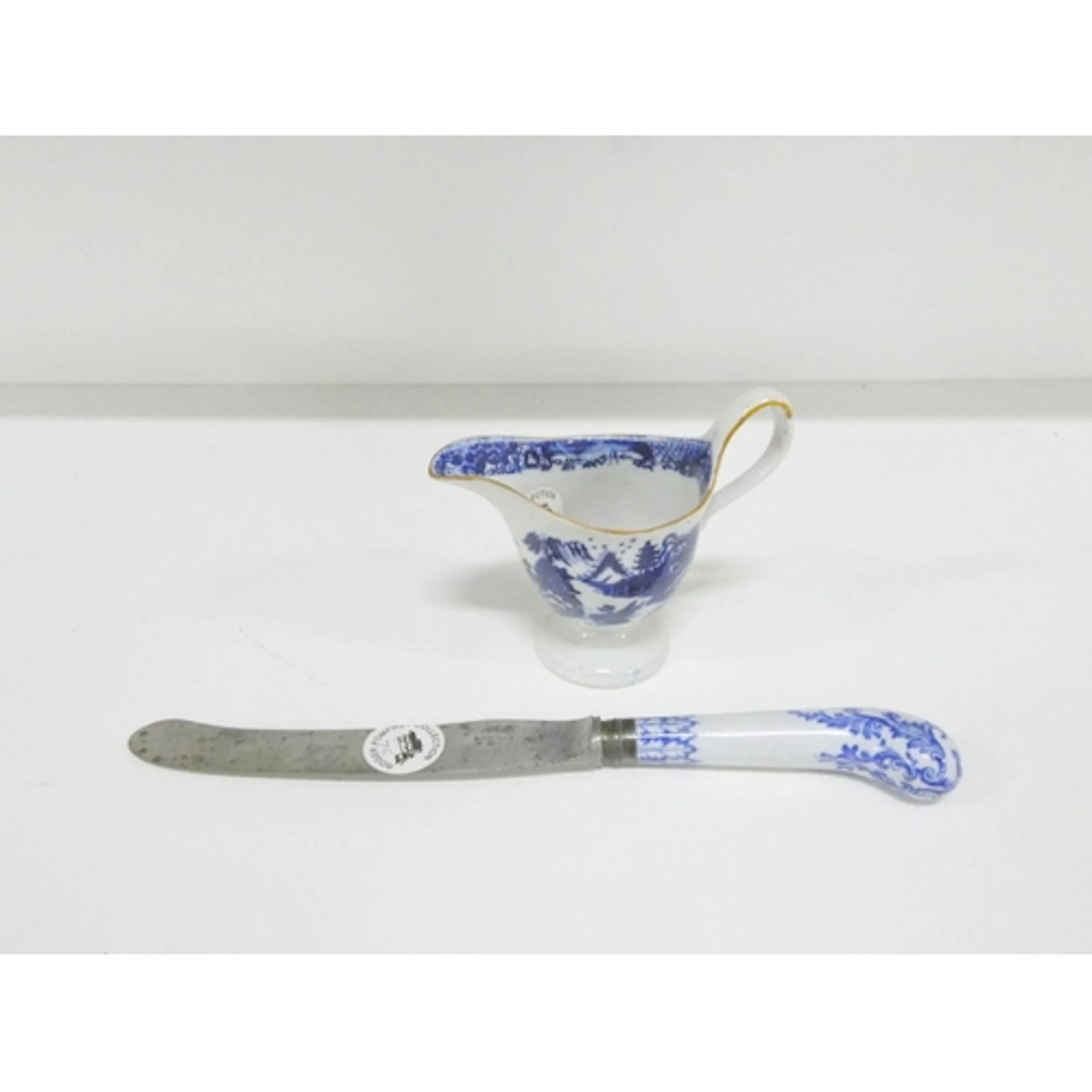 New Hall helmet shape jug printed in blue with a rare versio...