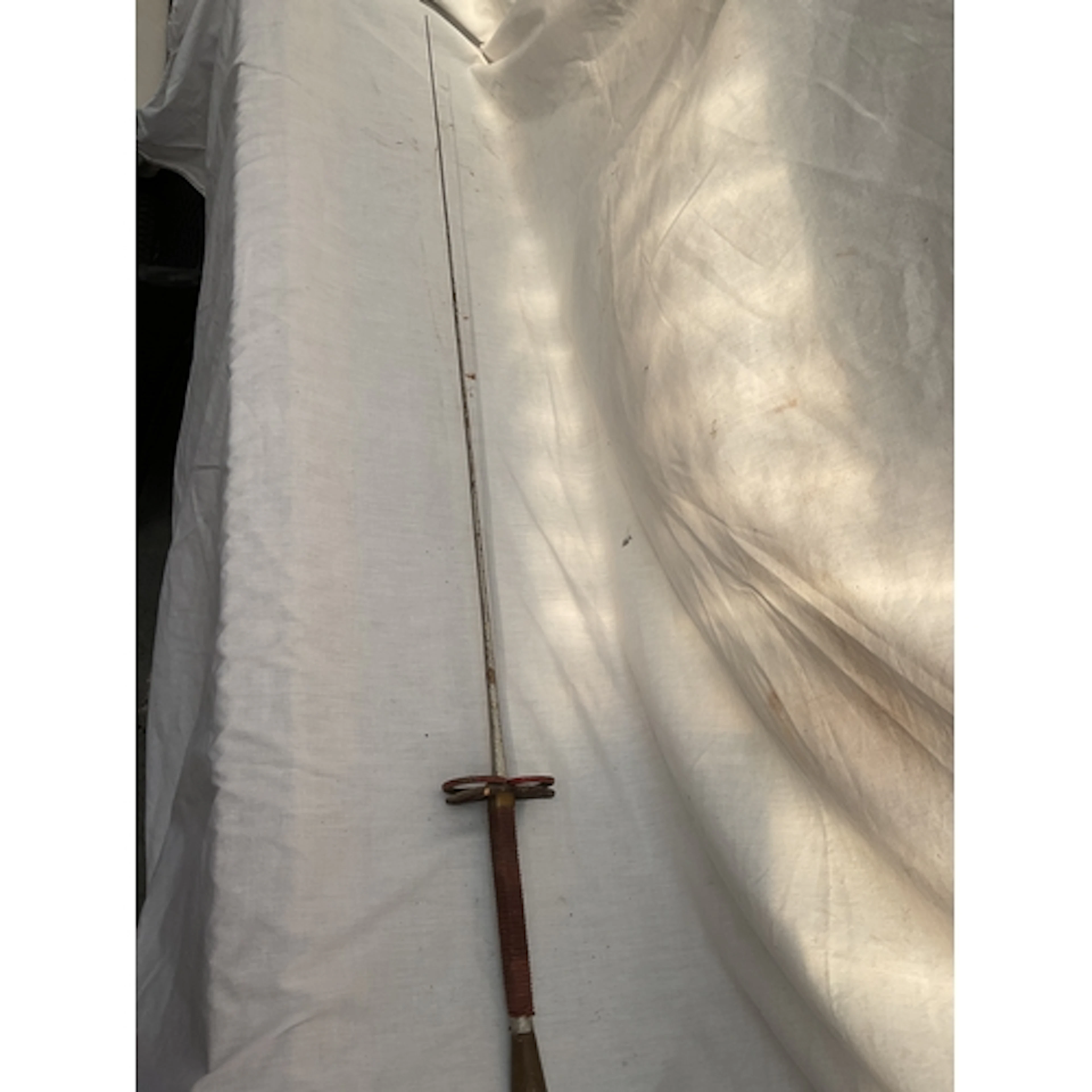 Fencing foil.