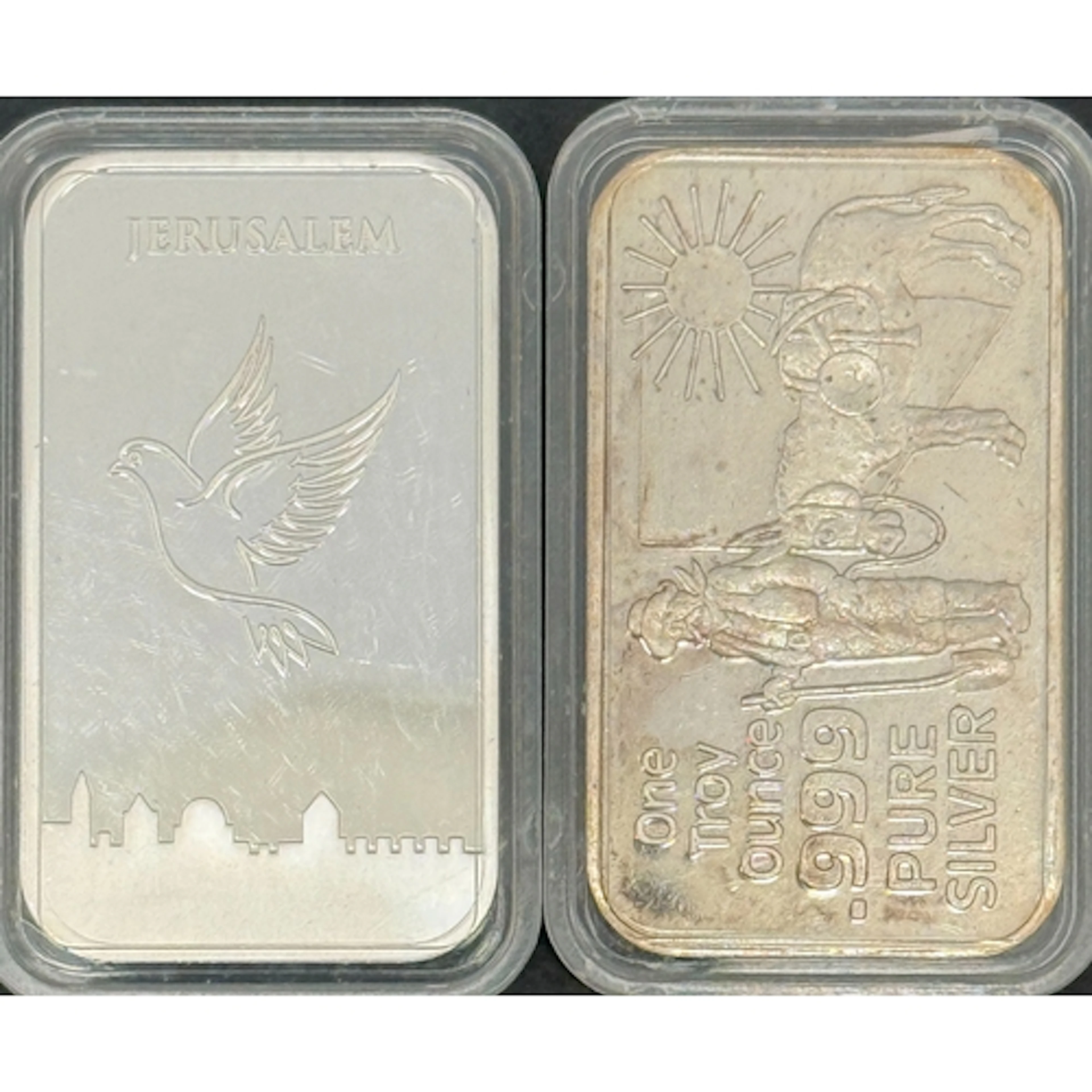 A pair of 1oz .999 fine silver ingots, comprising a Nevada C...