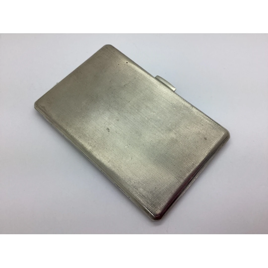 A Hallmarked Silver Cigarette Case, of rectangular form allo...