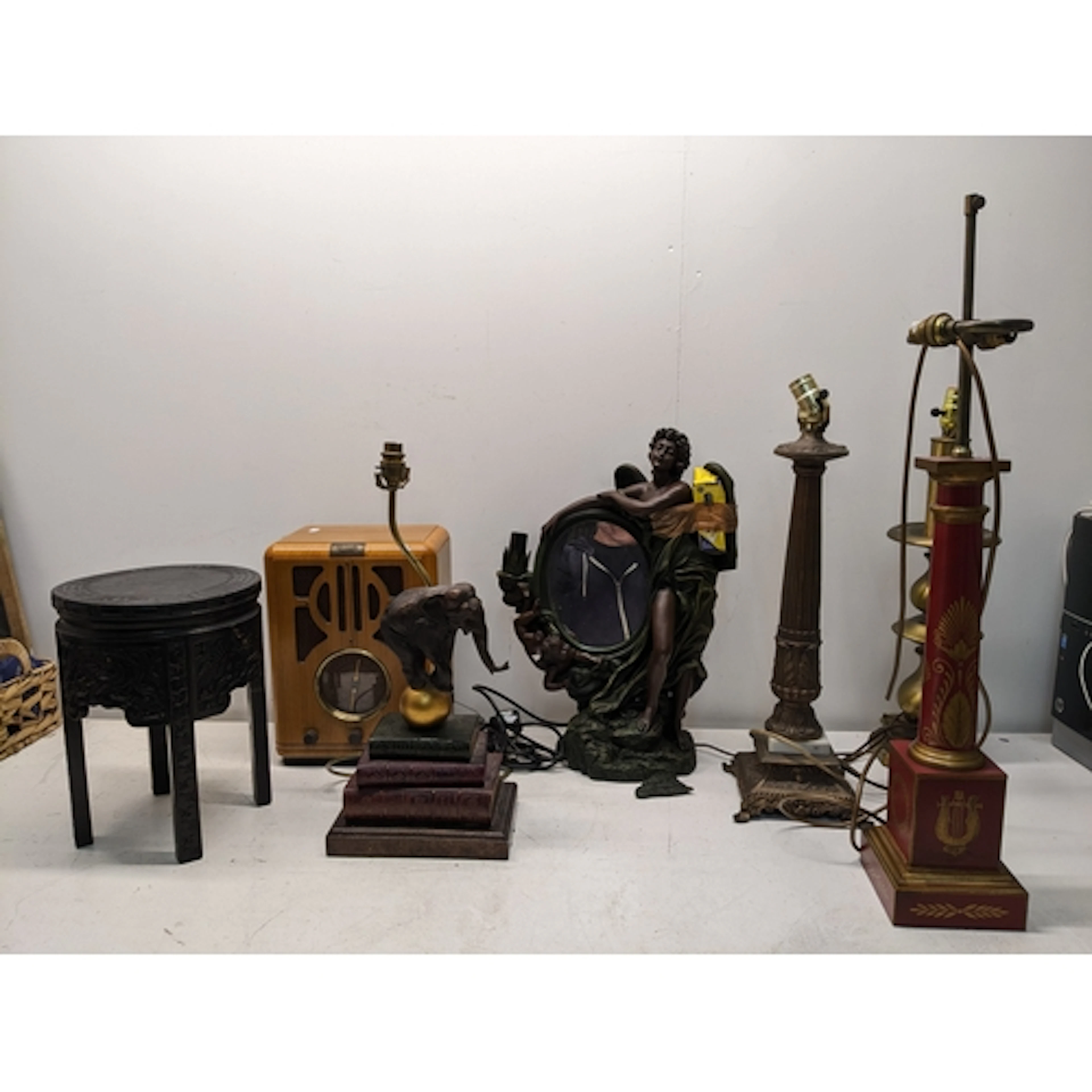 A mixed lot of table lamps and other items to include a bron...