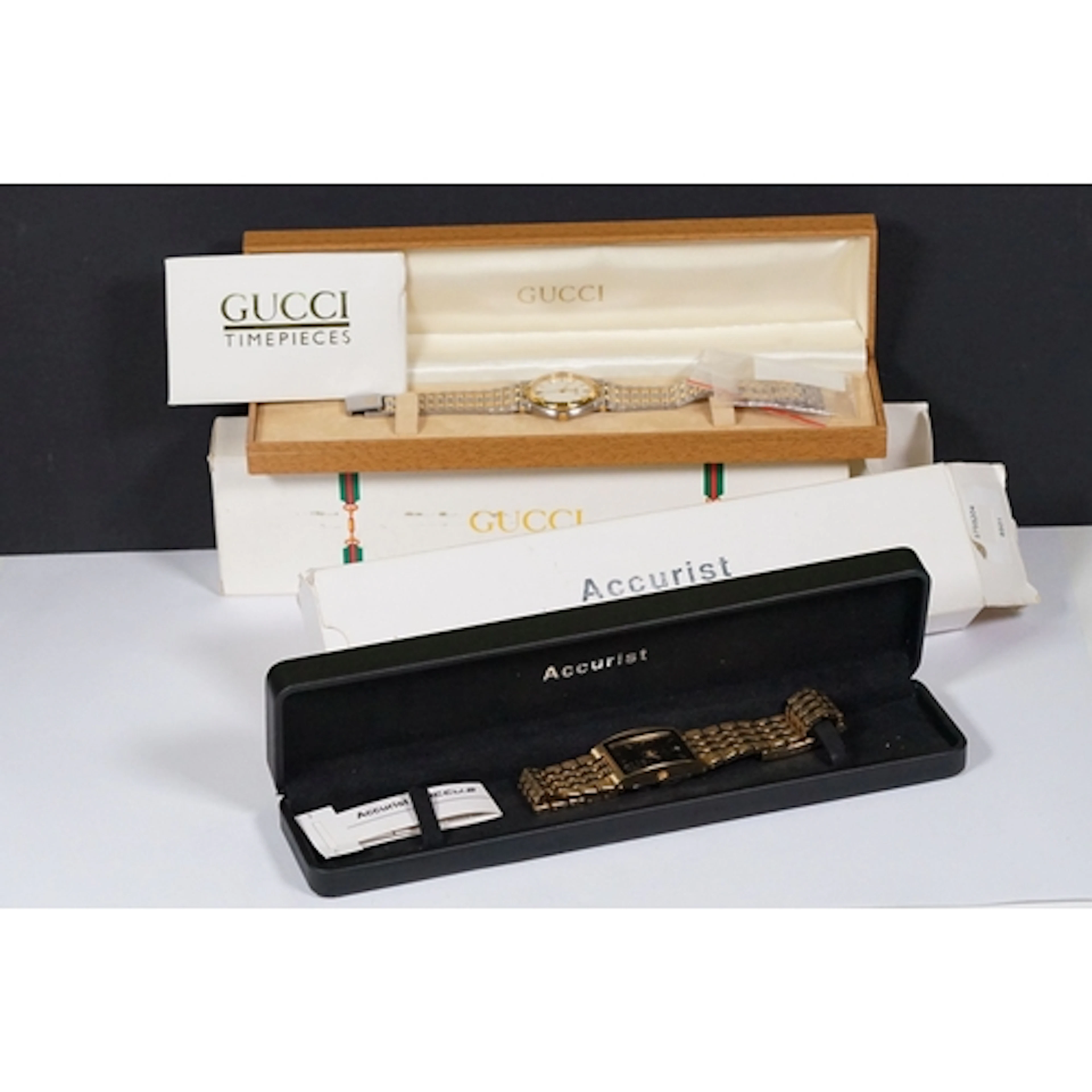 A vintage Gucci wristwatch with original box and papers toge...