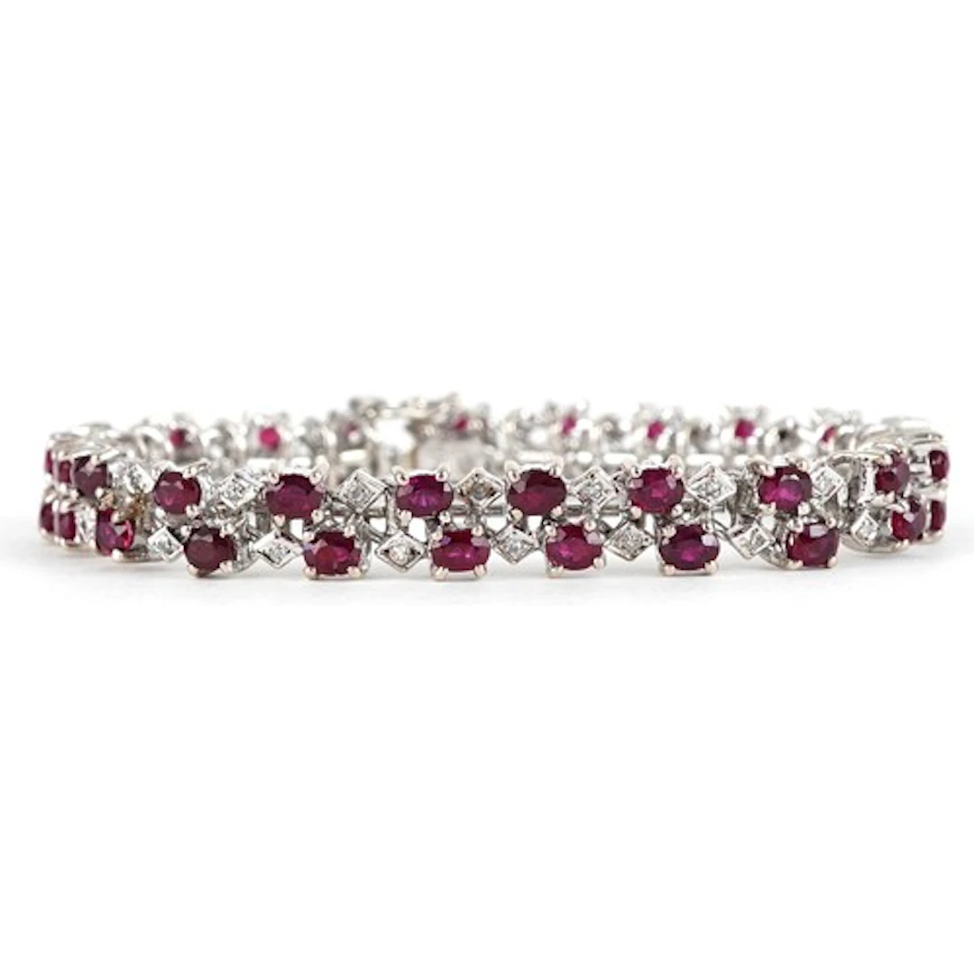 White metal ruby and diamond two row bracelet, the clasp mar...