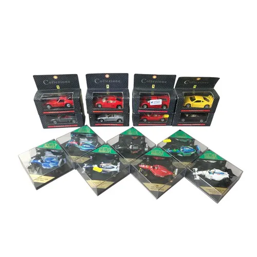 Collection of boxed die-cast model vehicles including Onyx 1...