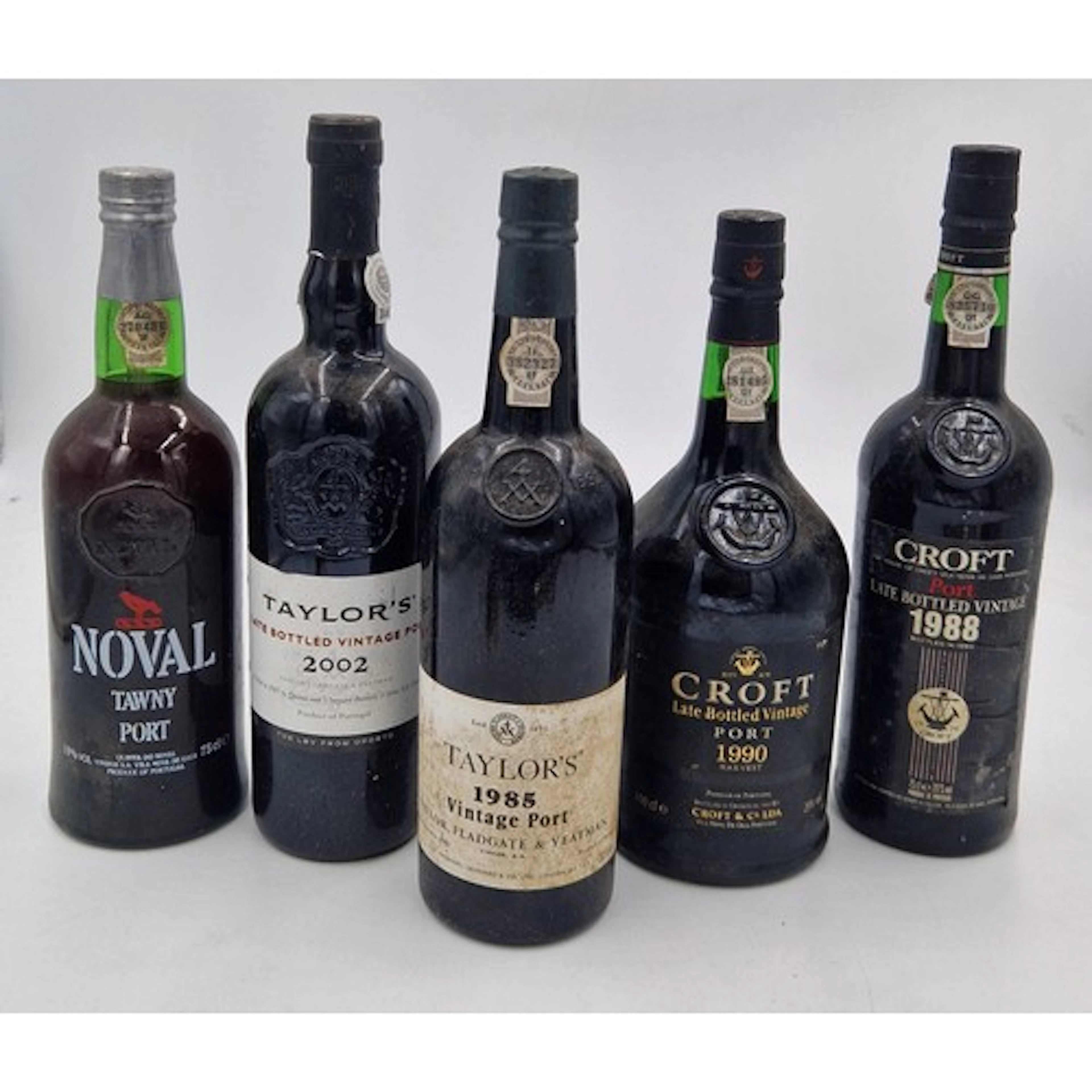 Five bottles of port to include: Taylor's Vintage Port 1985 ...