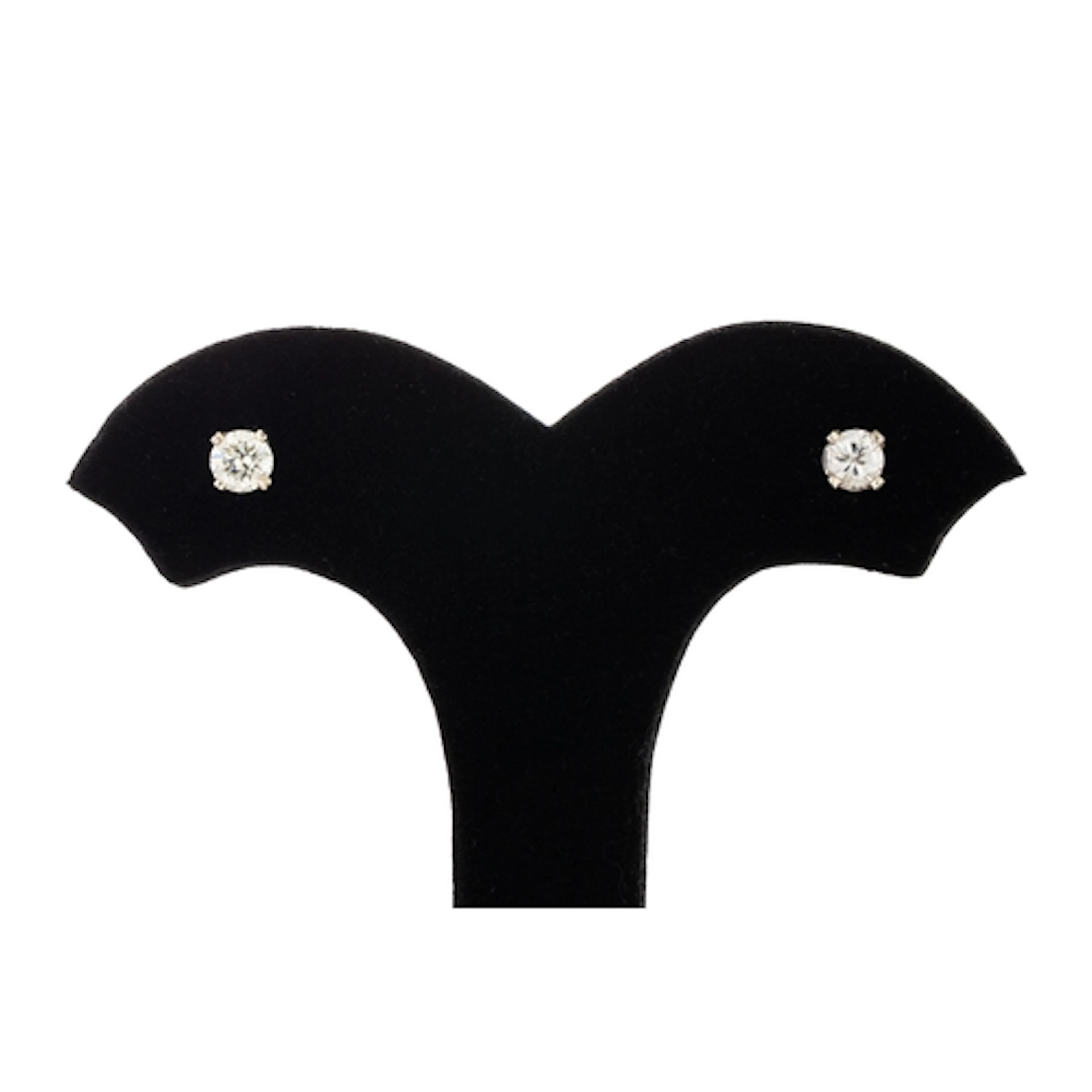 A PAIR OF DIAMOND STUD EARRINGS, the round diamonds mounted ...
