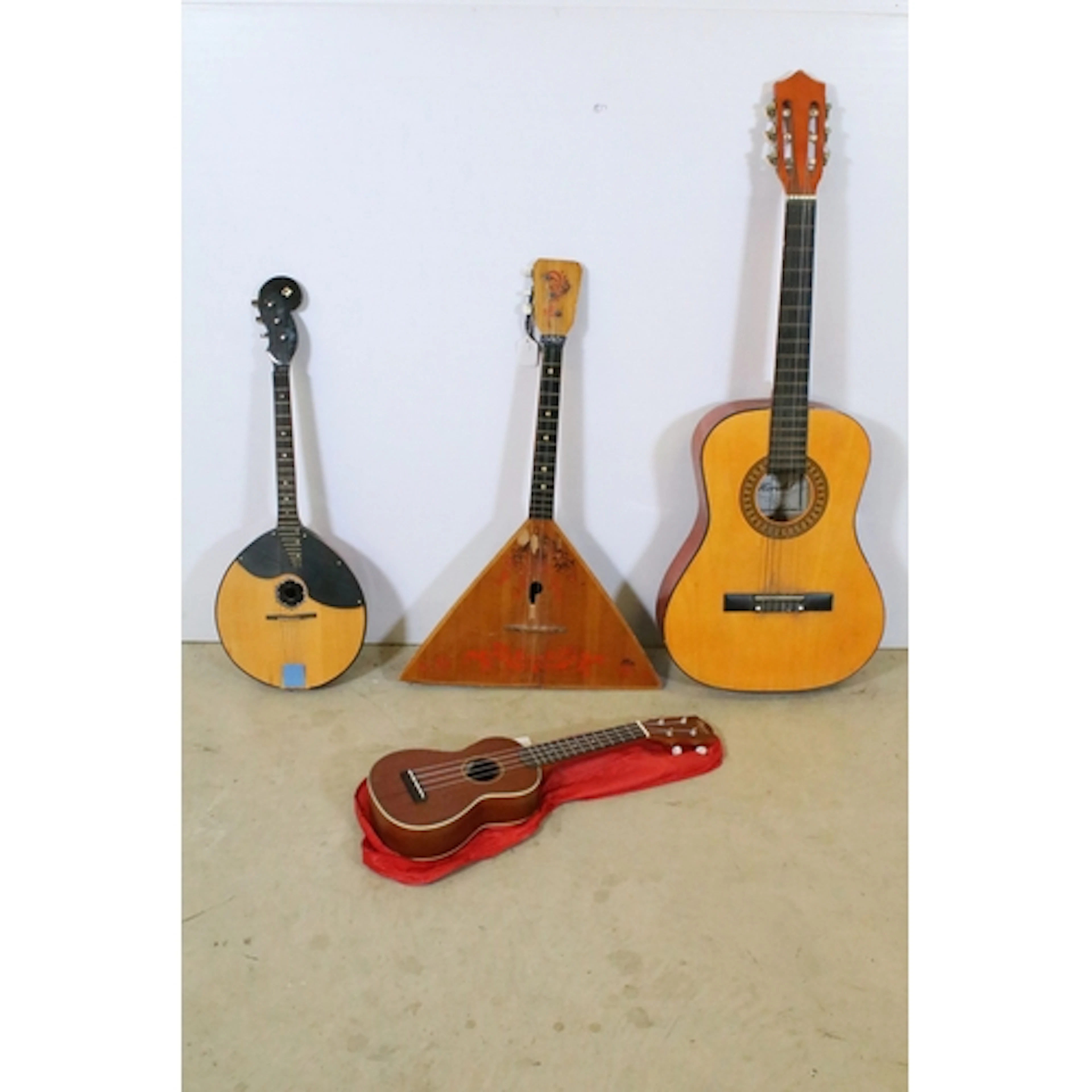 A collection of various stringed Instruments, to comprise an...
