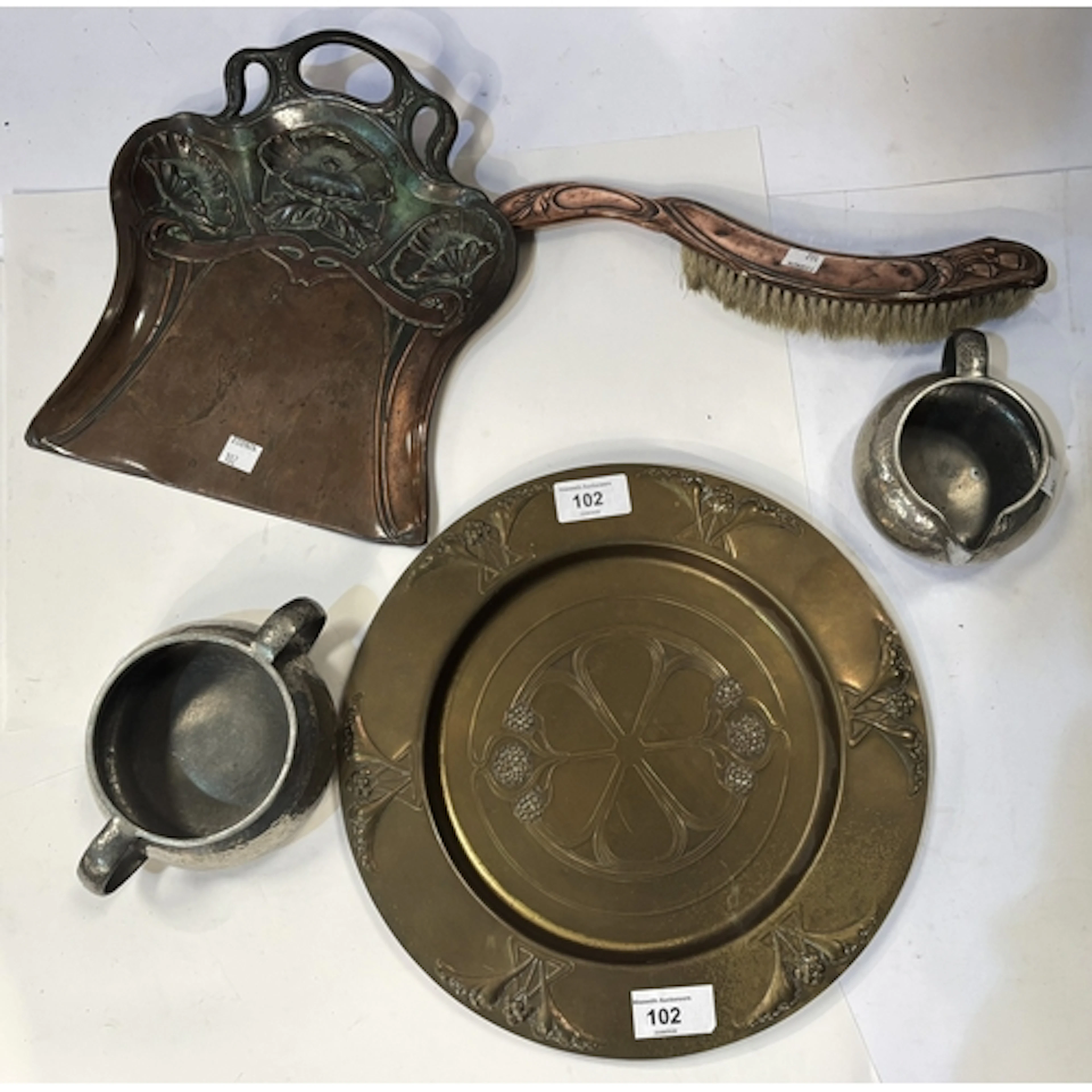 A WMF Art Nouveau design circular brass platter with stylise...