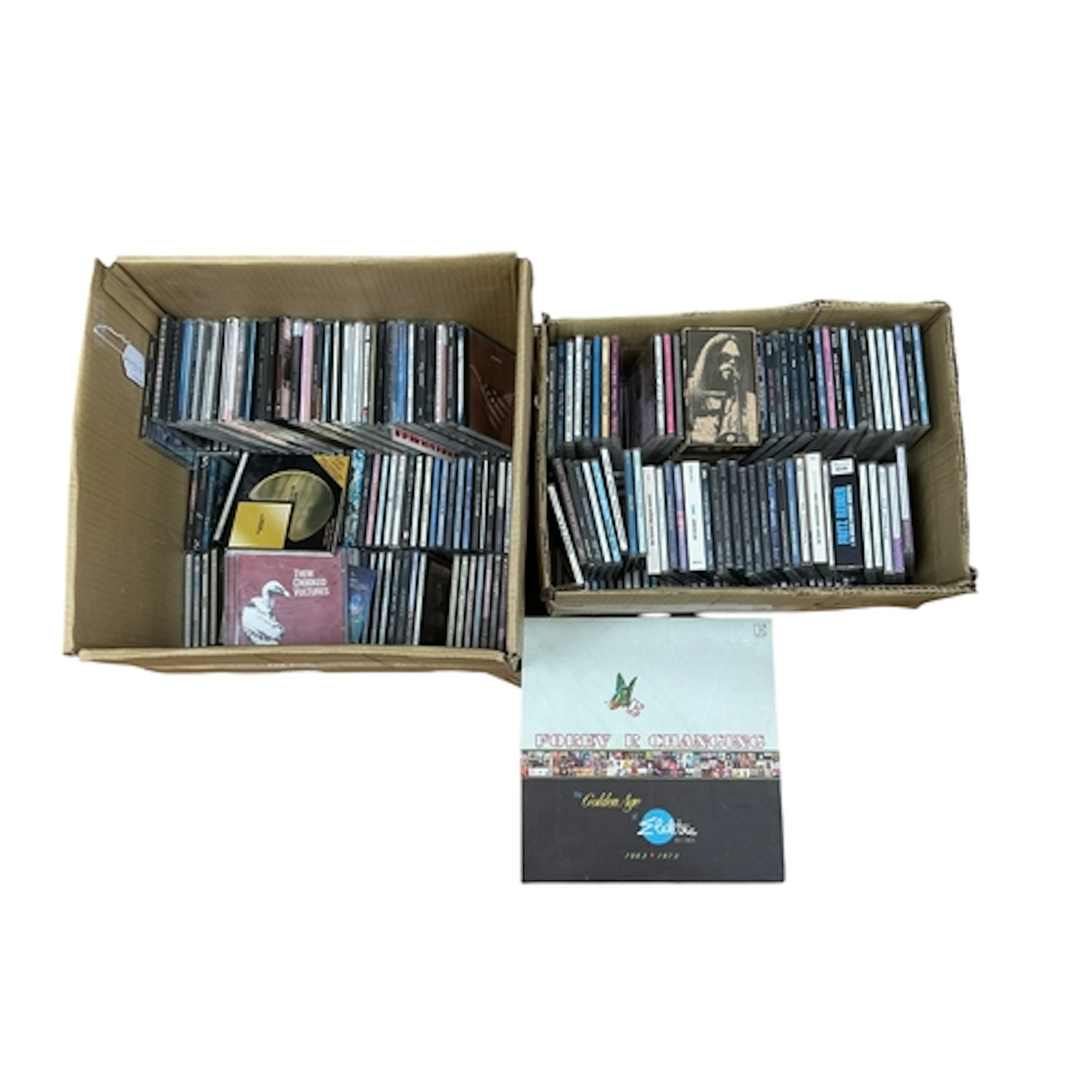 A large collection of music CDs, contained within two boxes,...