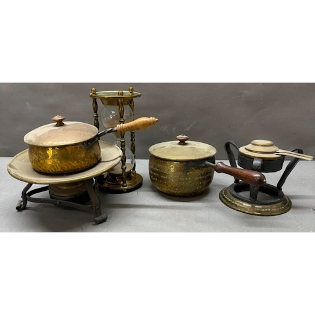A selection of brass to include two fondue sets and an hour ...