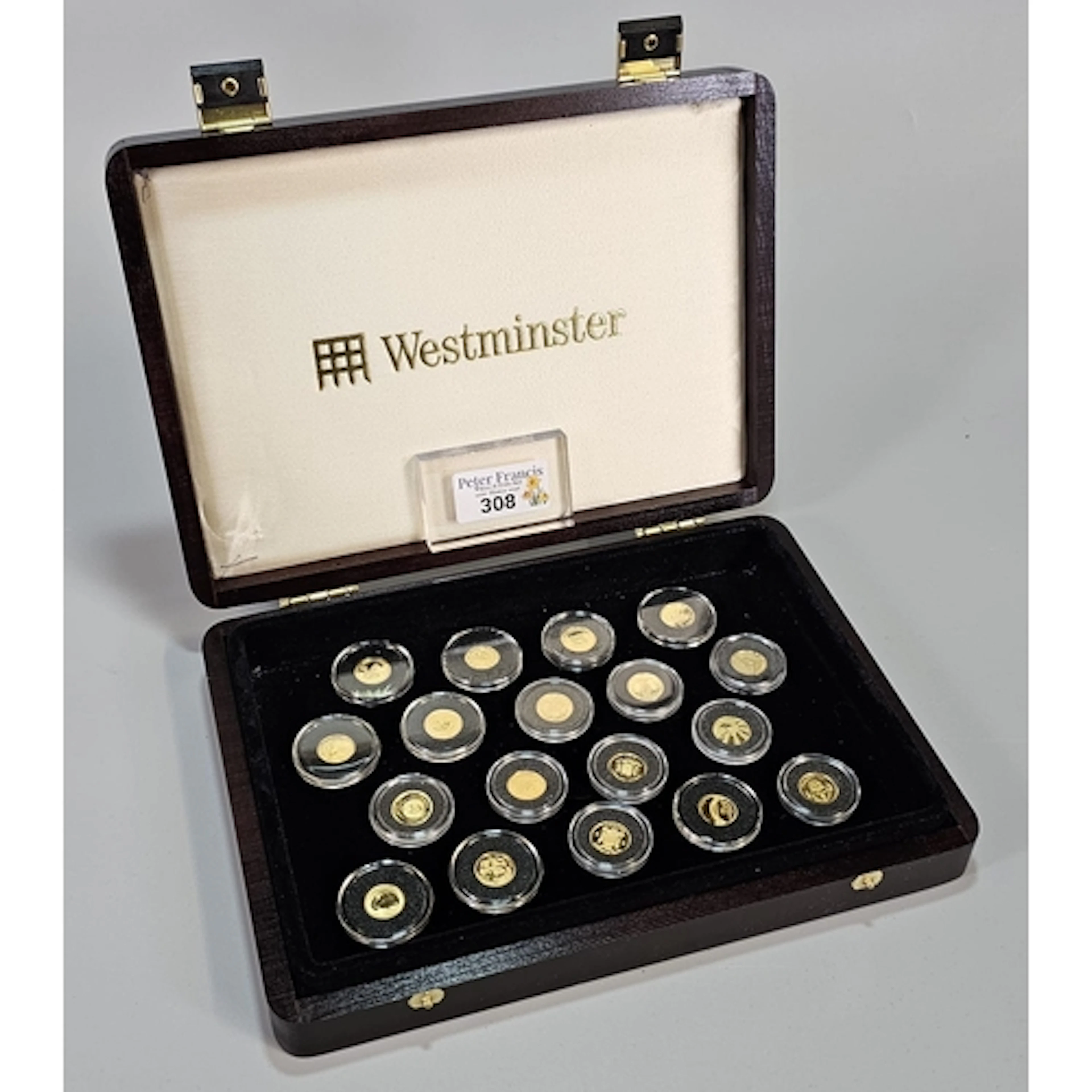 Collection of eighteen gold coins to include: Australian nug...