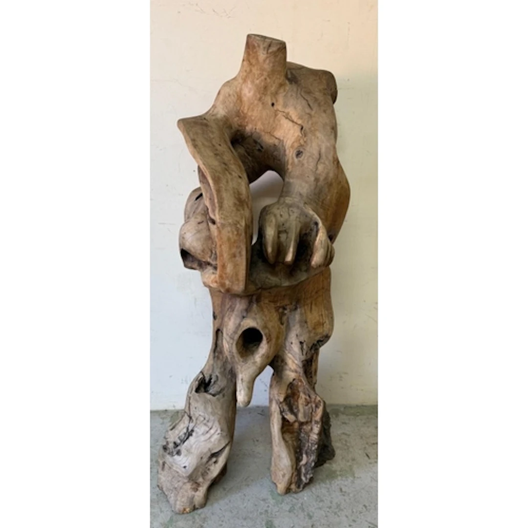 An abstract figurative olive wood sculpture in the manner of...