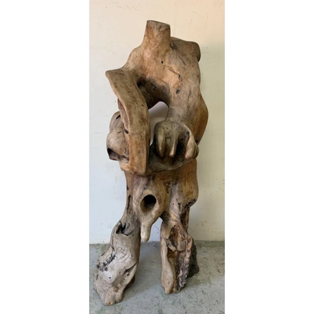 An abstract figurative olive wood sculpture in the manner of...