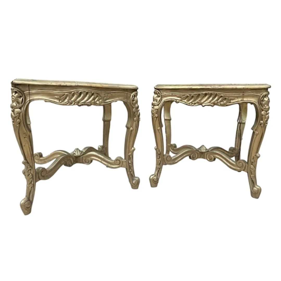 A pair of Italian Baroque inspired giltwood and glass side o...