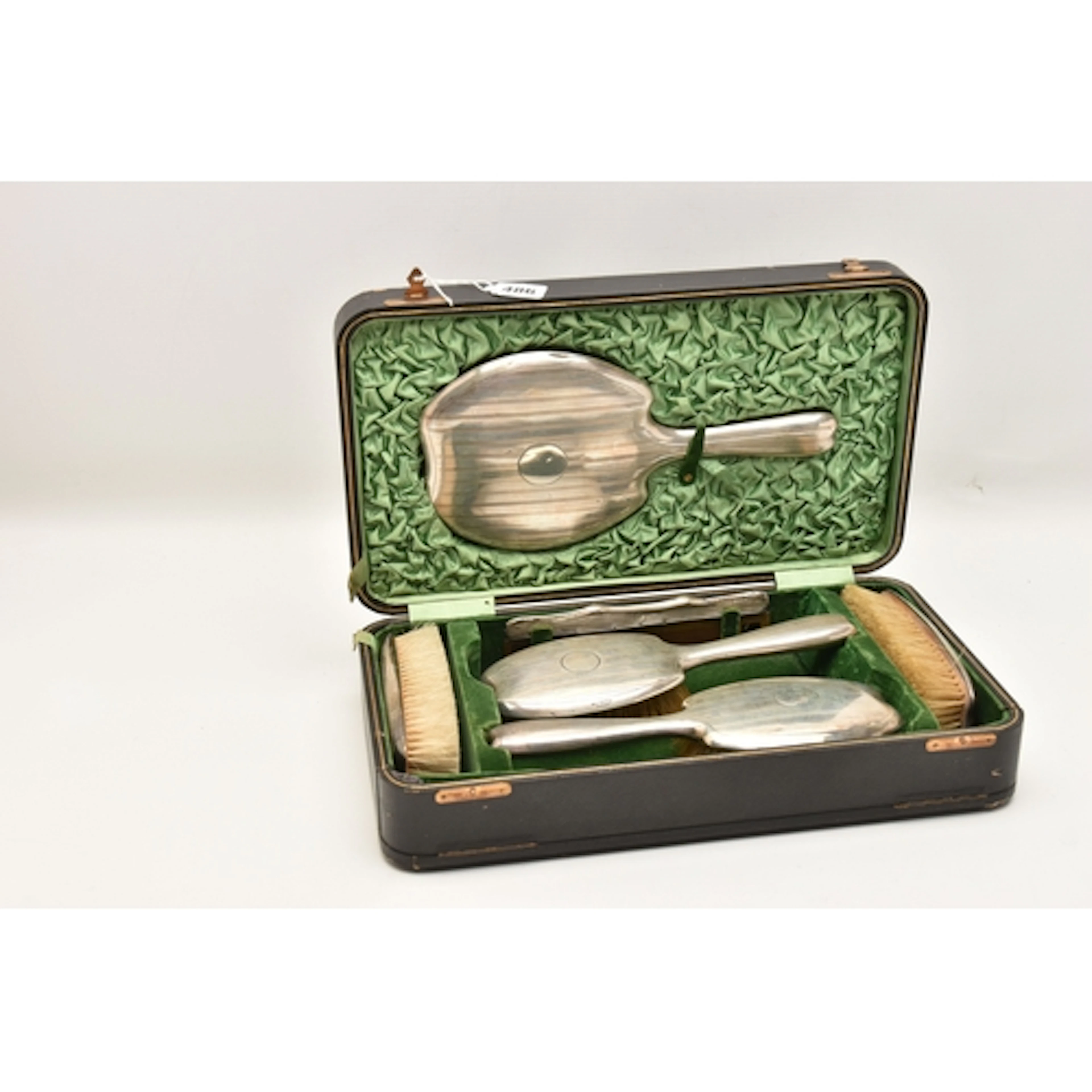 A CASED EARLY 20TH CENTURY SILVER TRAVEL VANITY SET, compris...