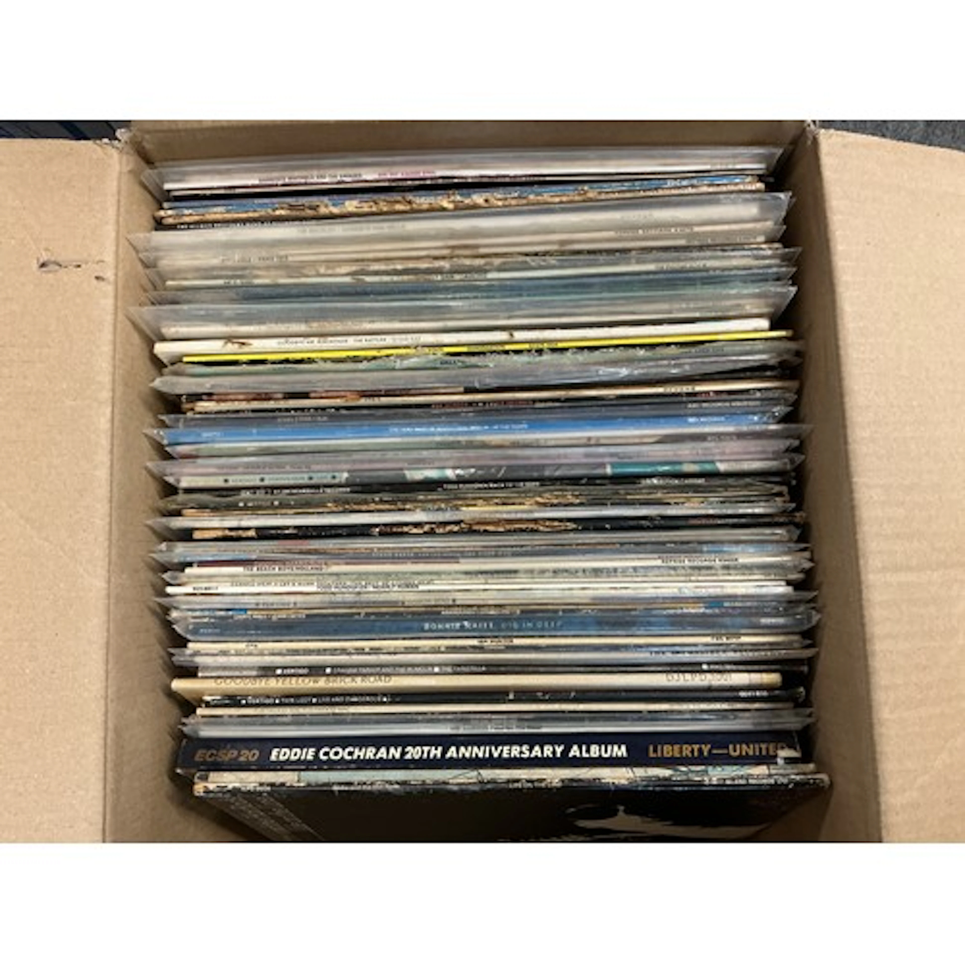 A collection of LPs by various artists including Thin Lizzy,...