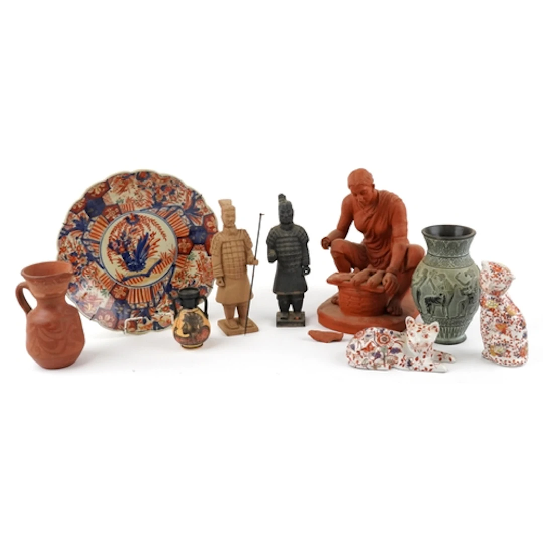 Collection of Asian and Eastern porcelain and pottery items ...