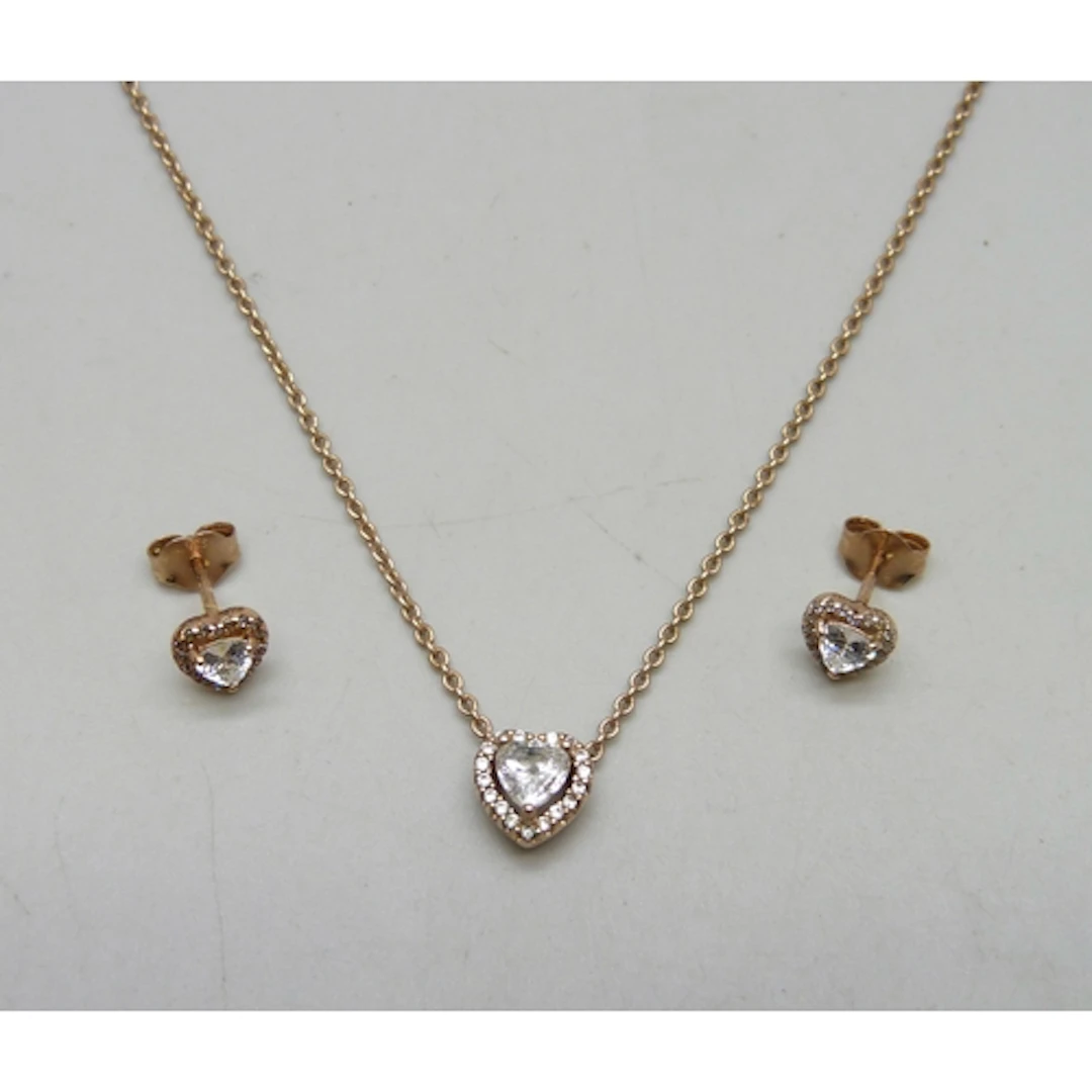 A pair of silver gilt Pandora earrings and a metal Pandora n...
