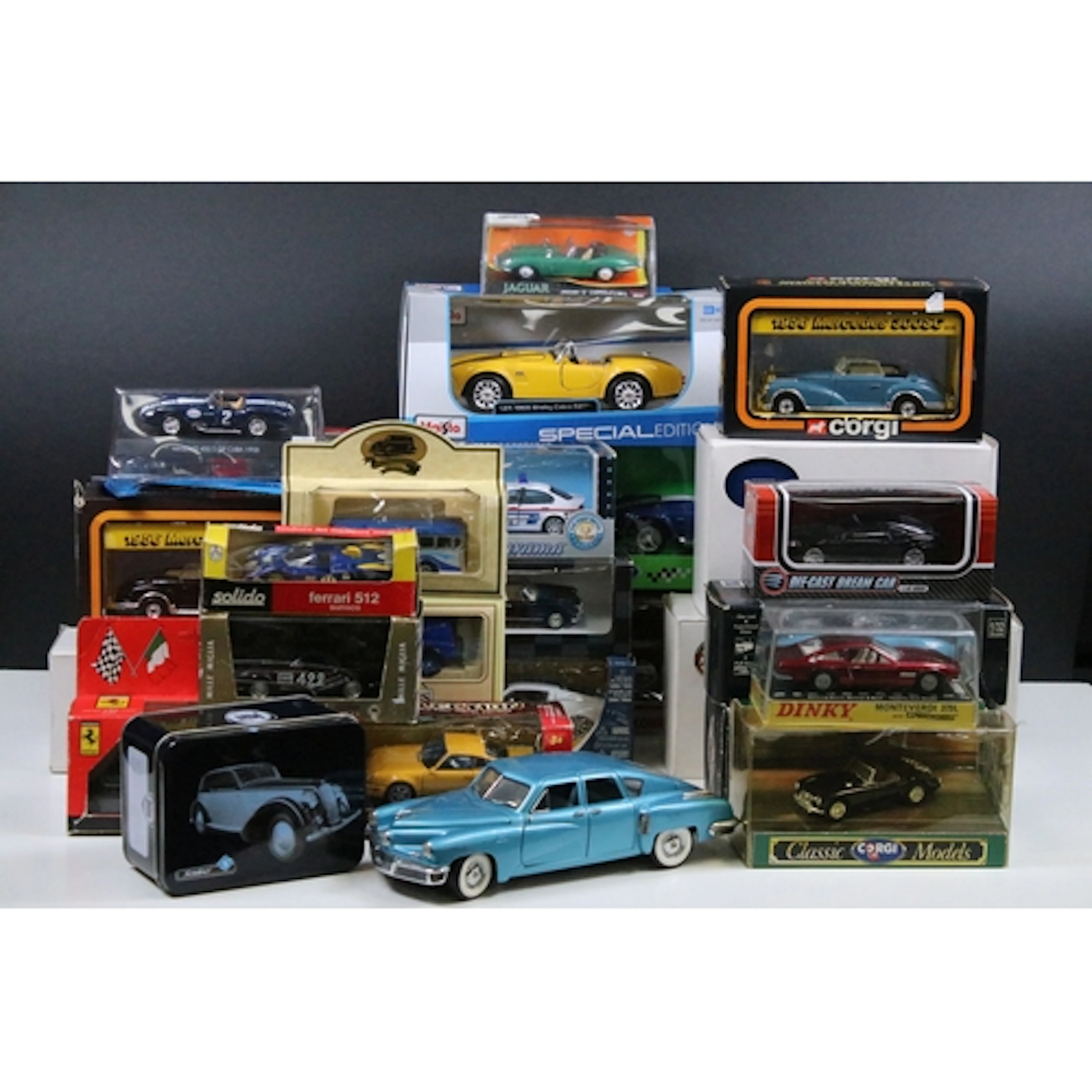 27 Boxed / cased diecast models to include Solido, Cararama,...