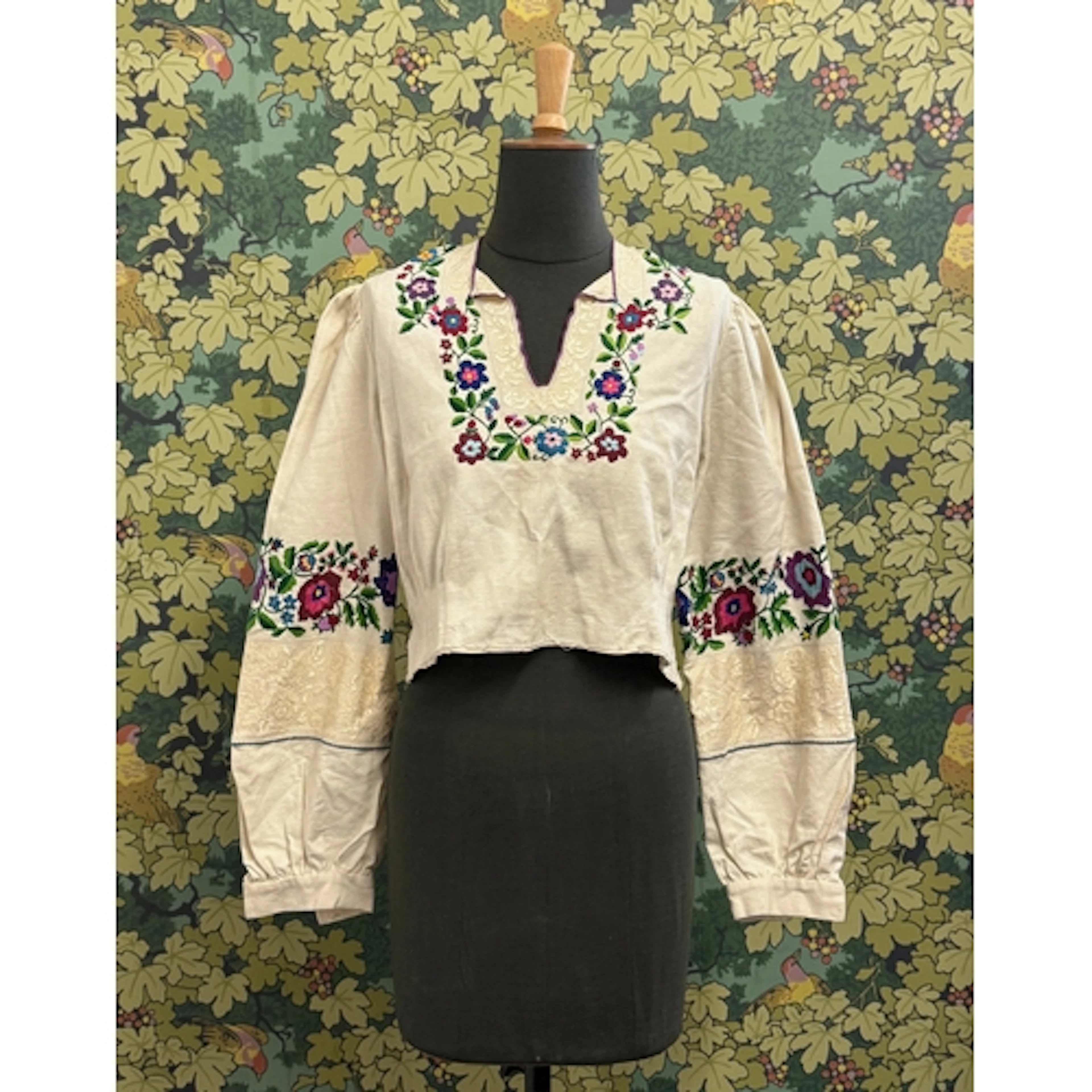 A vintage floral hand embroidered Eastern European bodice an...