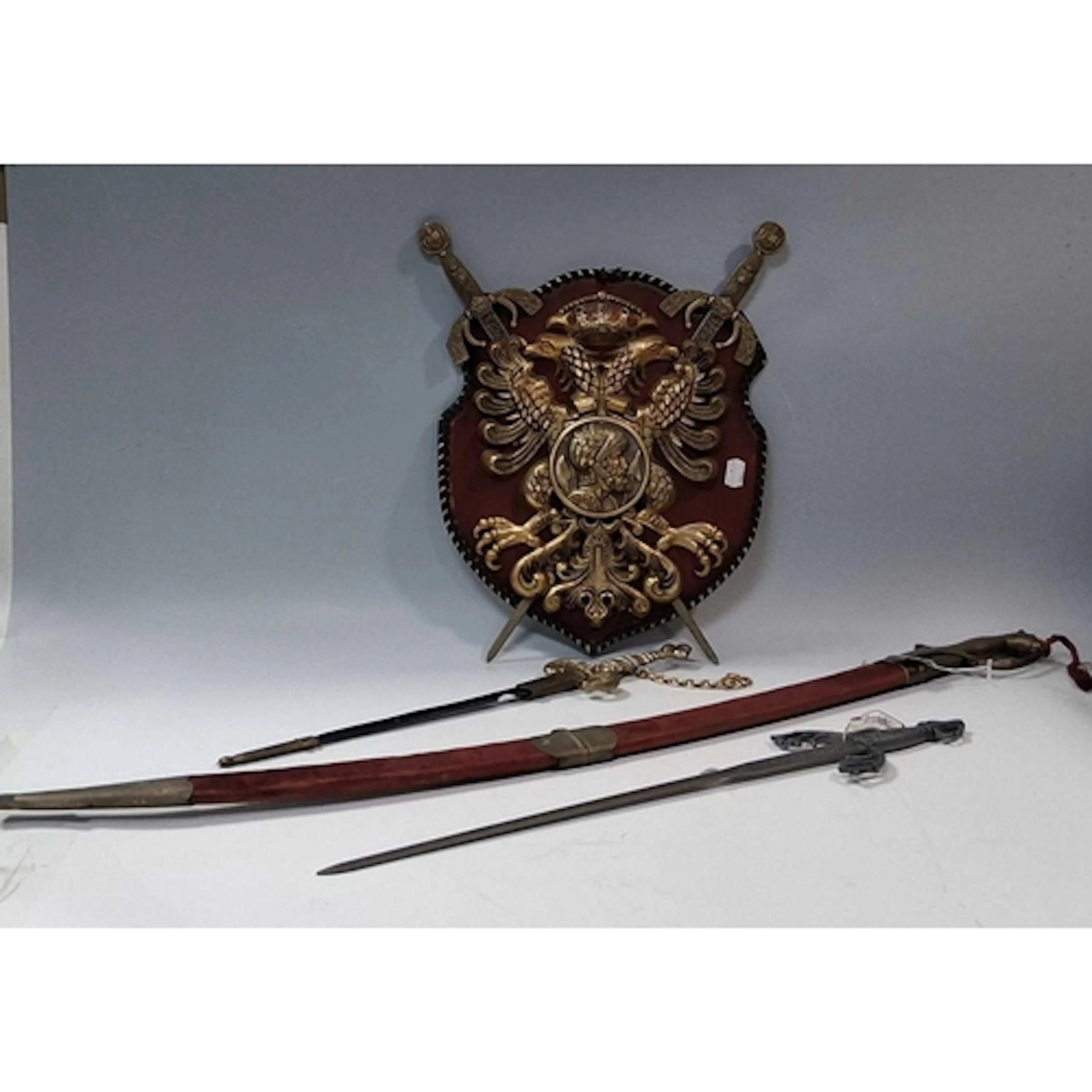 A SMALL GROUP OF CEREMONIAL SWORDS, to include a vintage Ind...