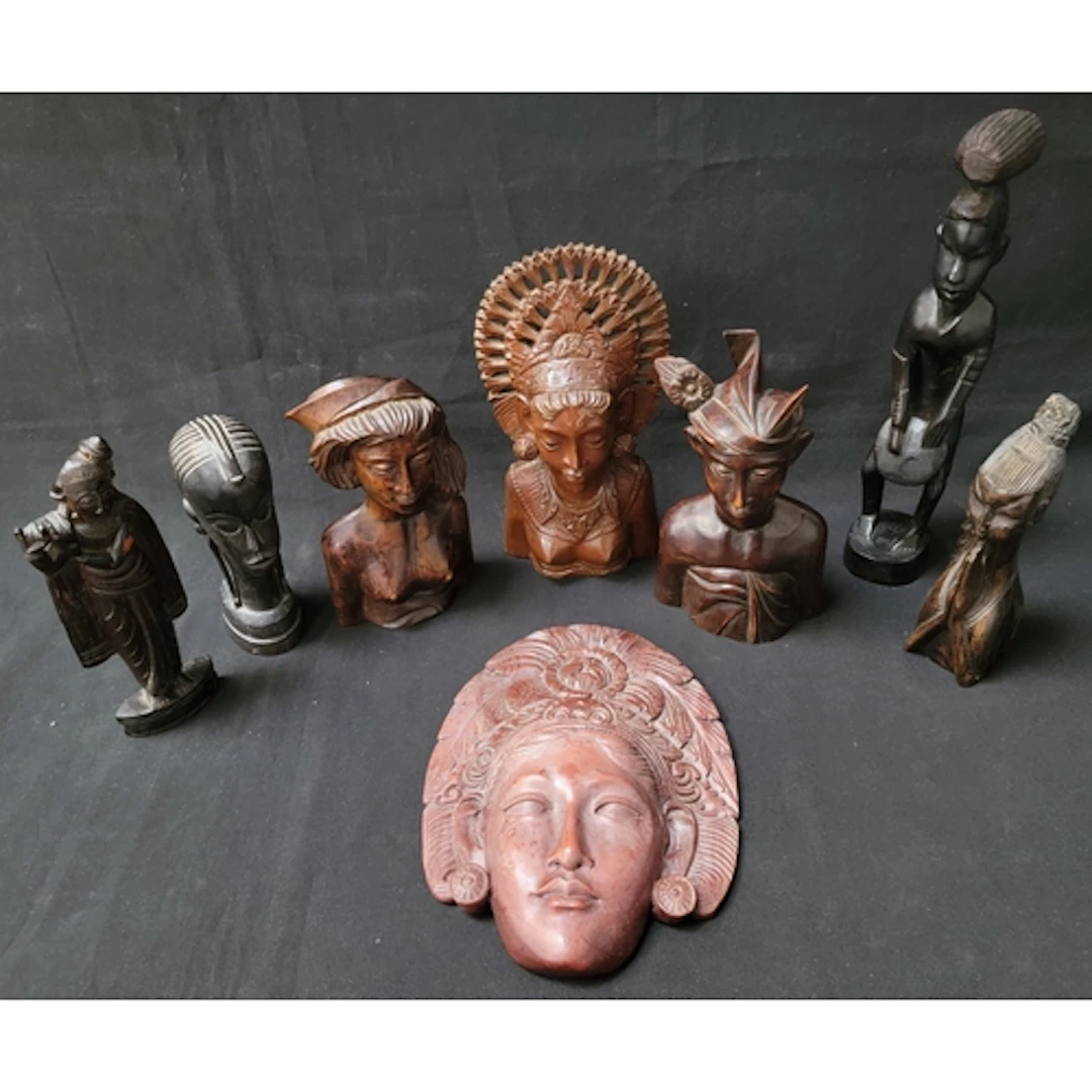 SELECTION OF EIGHT WOODEN FIGURINES including examples from...
