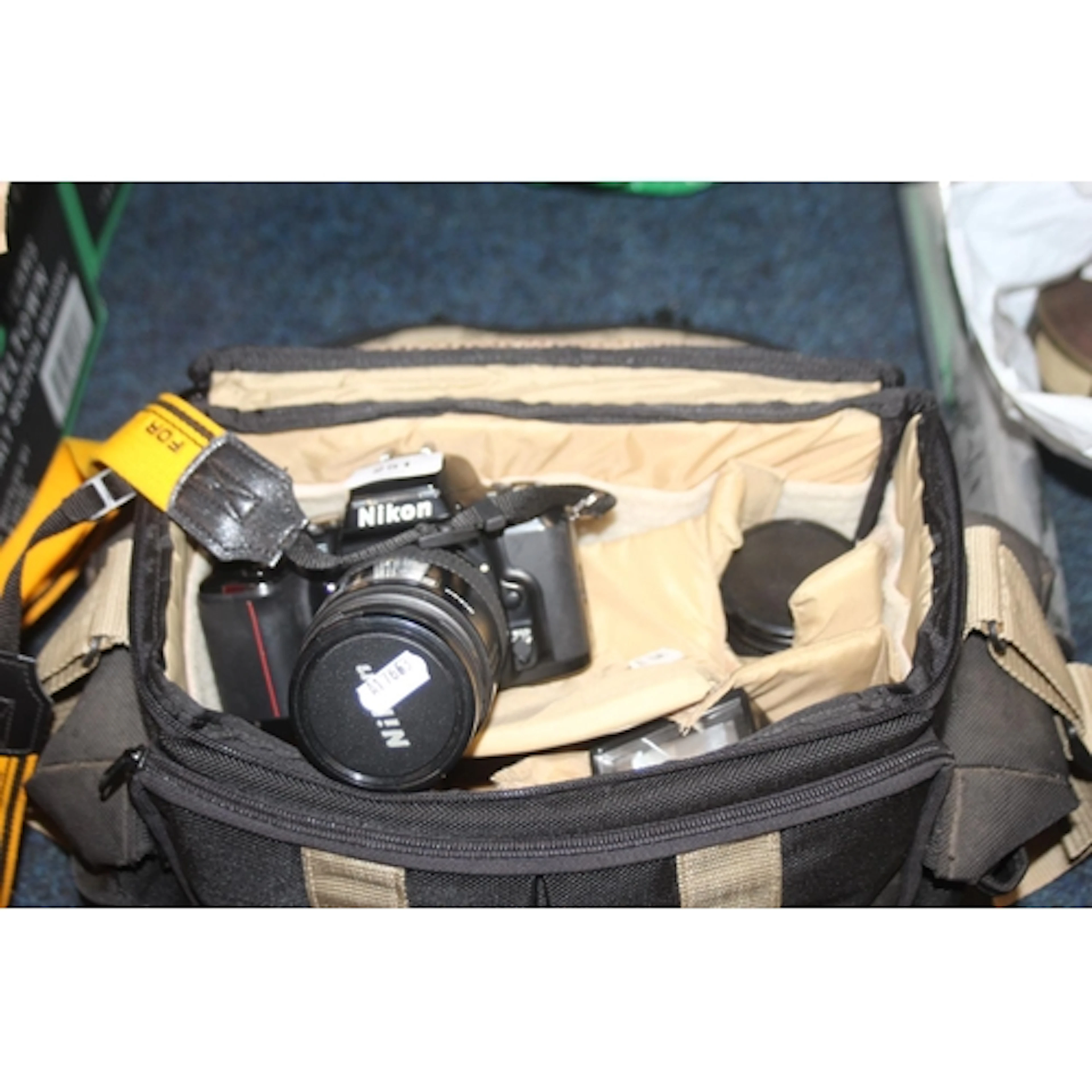 Nikon F601 camera with lens and flash in fitted bag