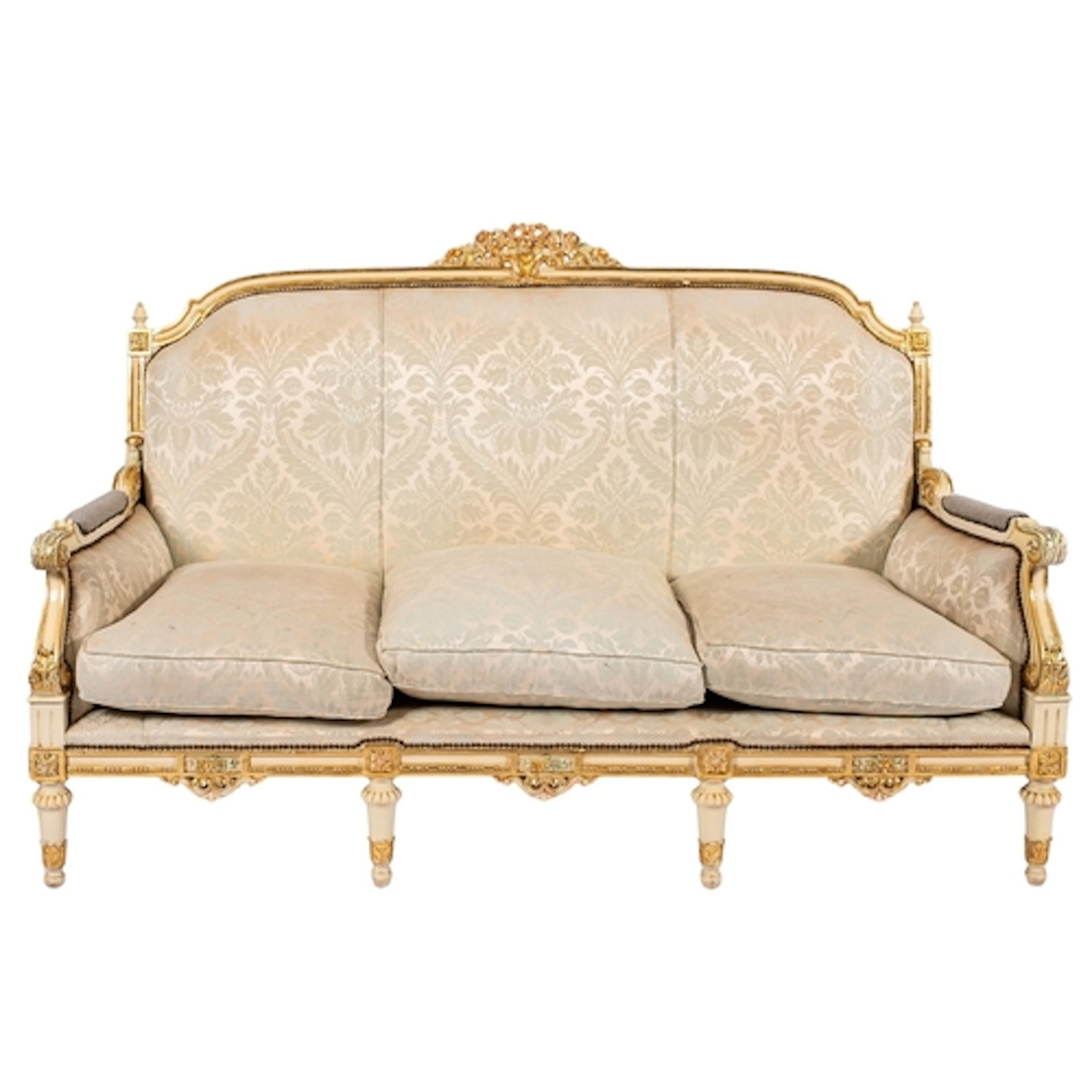 A pair of carved, painted and parcel giltwood sofas in Neapo...