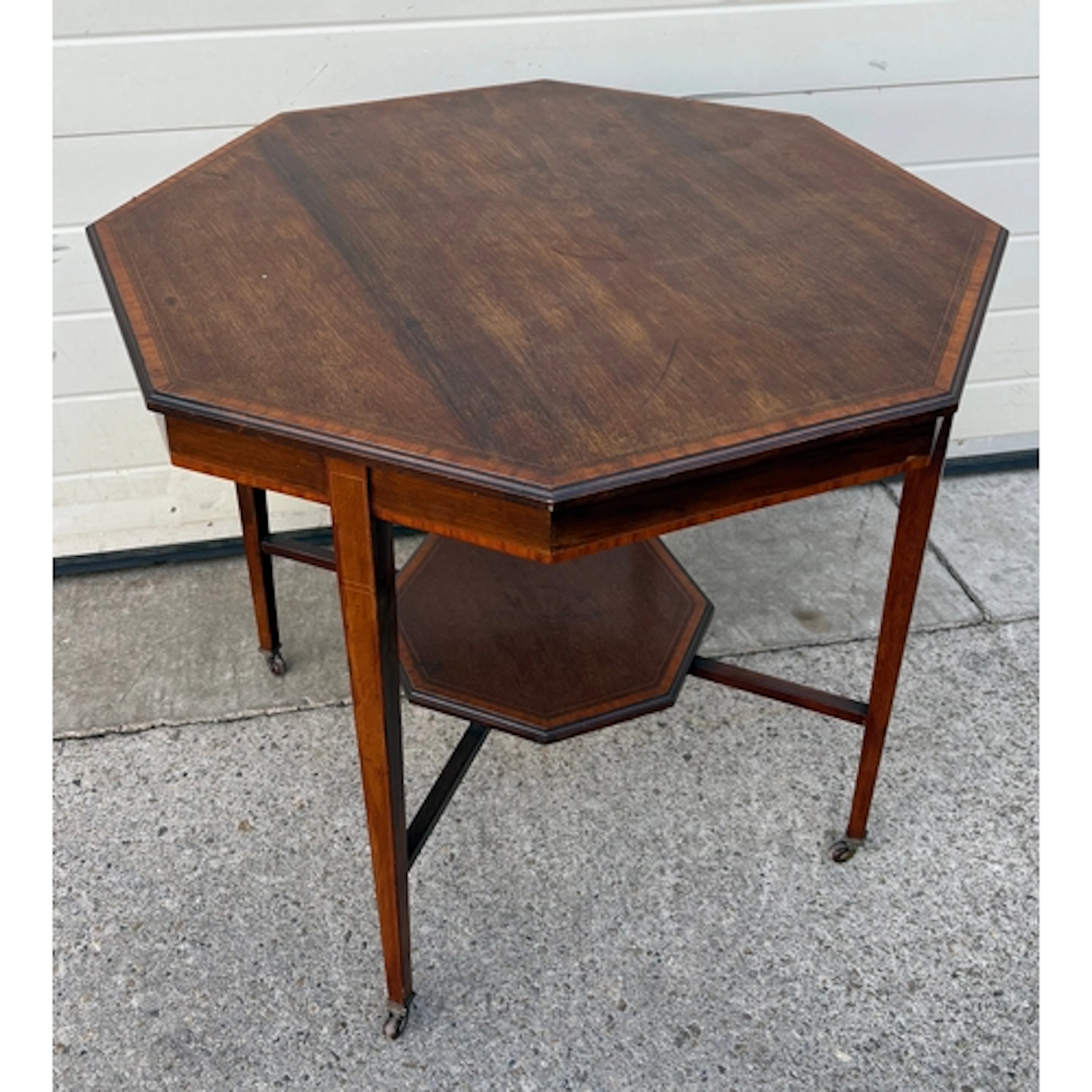 An Edwardian mahogany occasional table