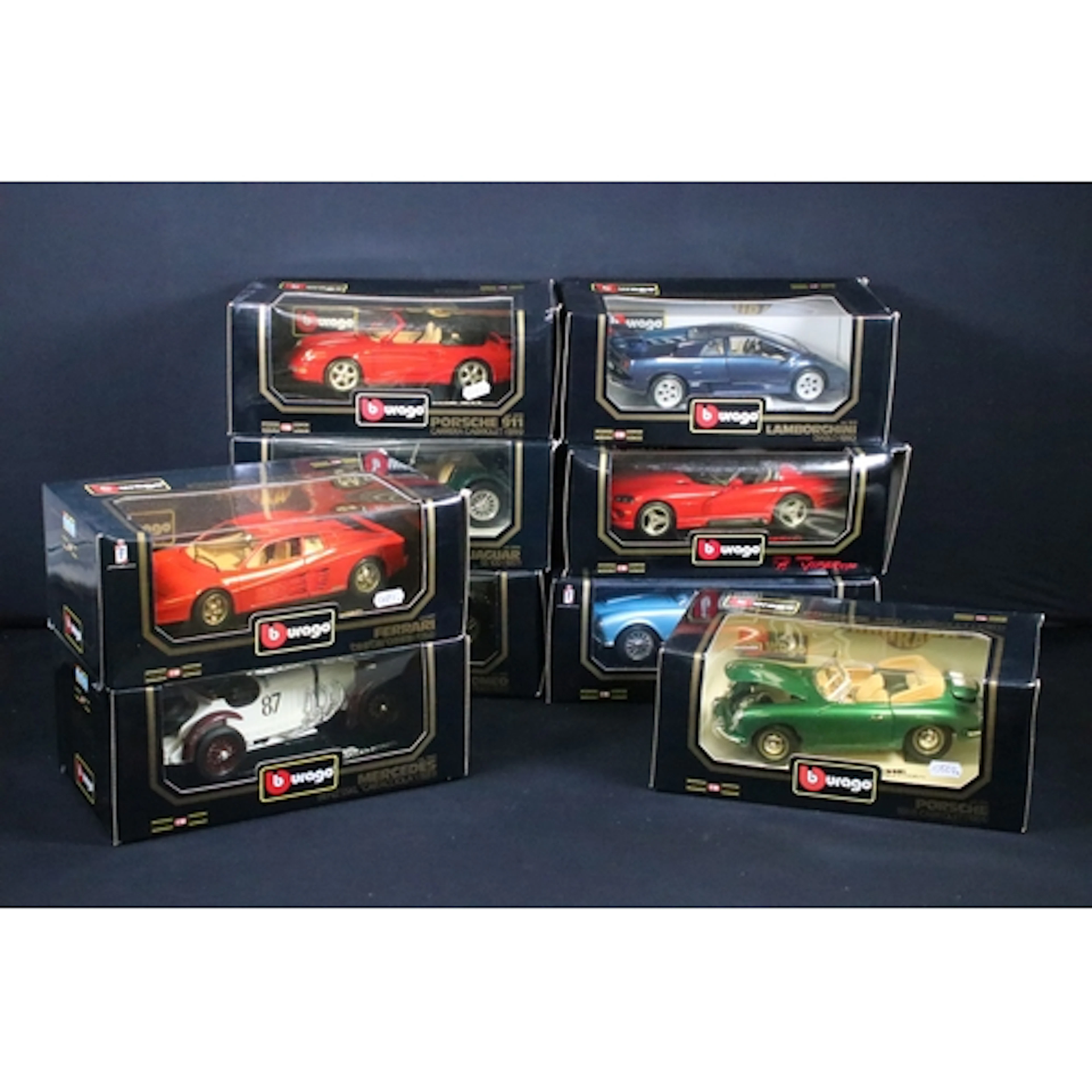Nine boxed 1/18 Burago Diamonds diecast models to include Po...