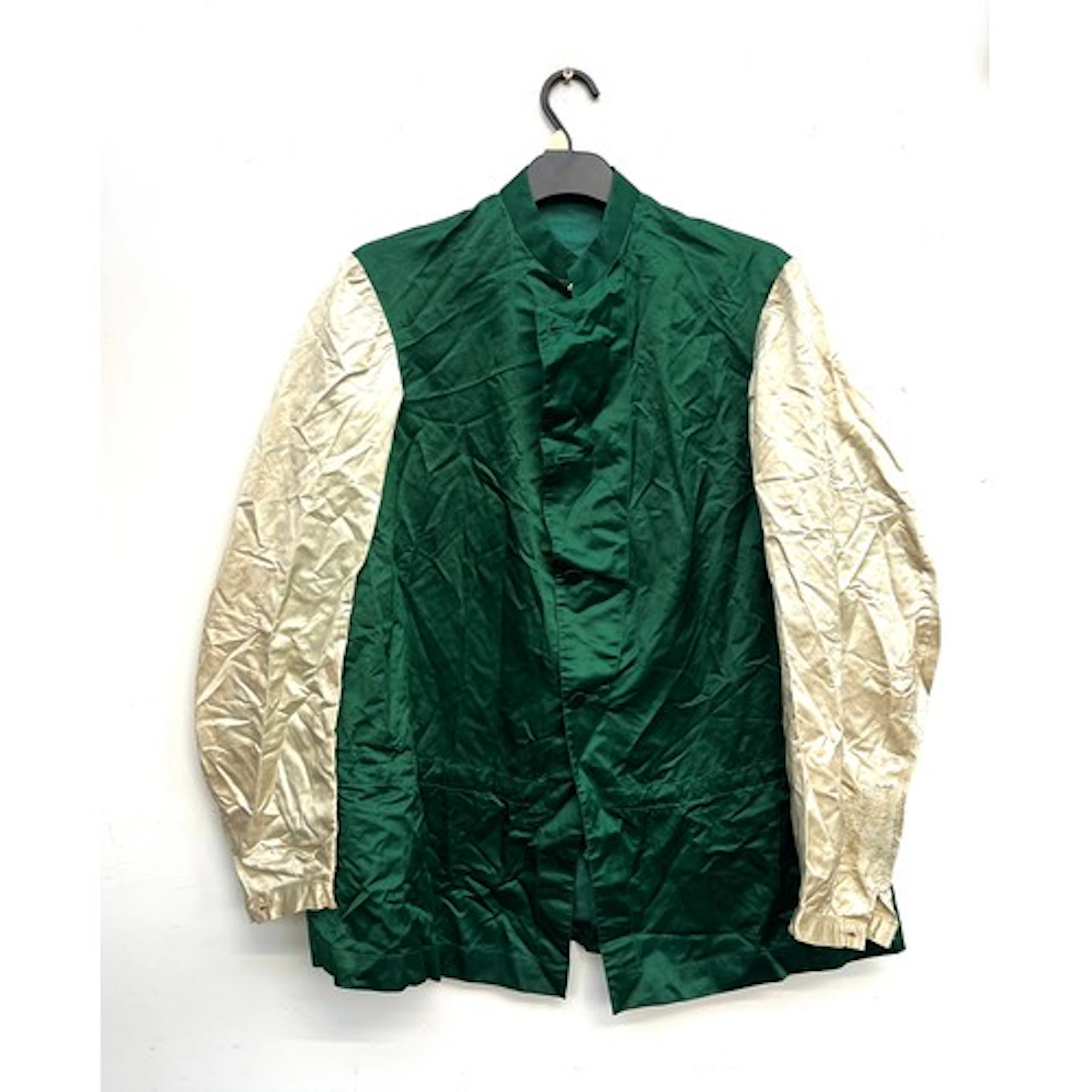 A set of emerald green jockey silks with cap (af), cap with ...