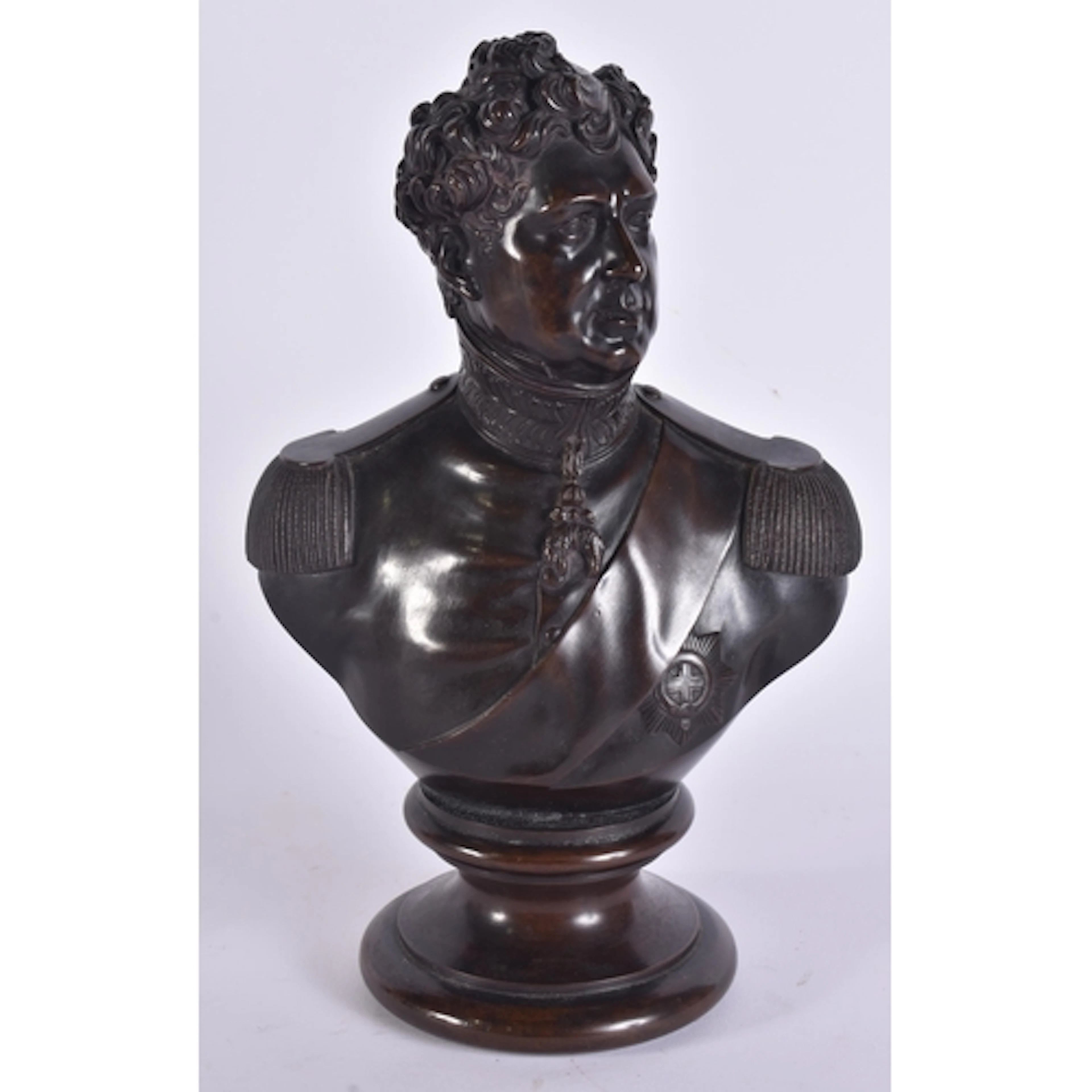 A 19TH CENTURY BRONZE BUST OF GEORGE IV modelled upon a pede...