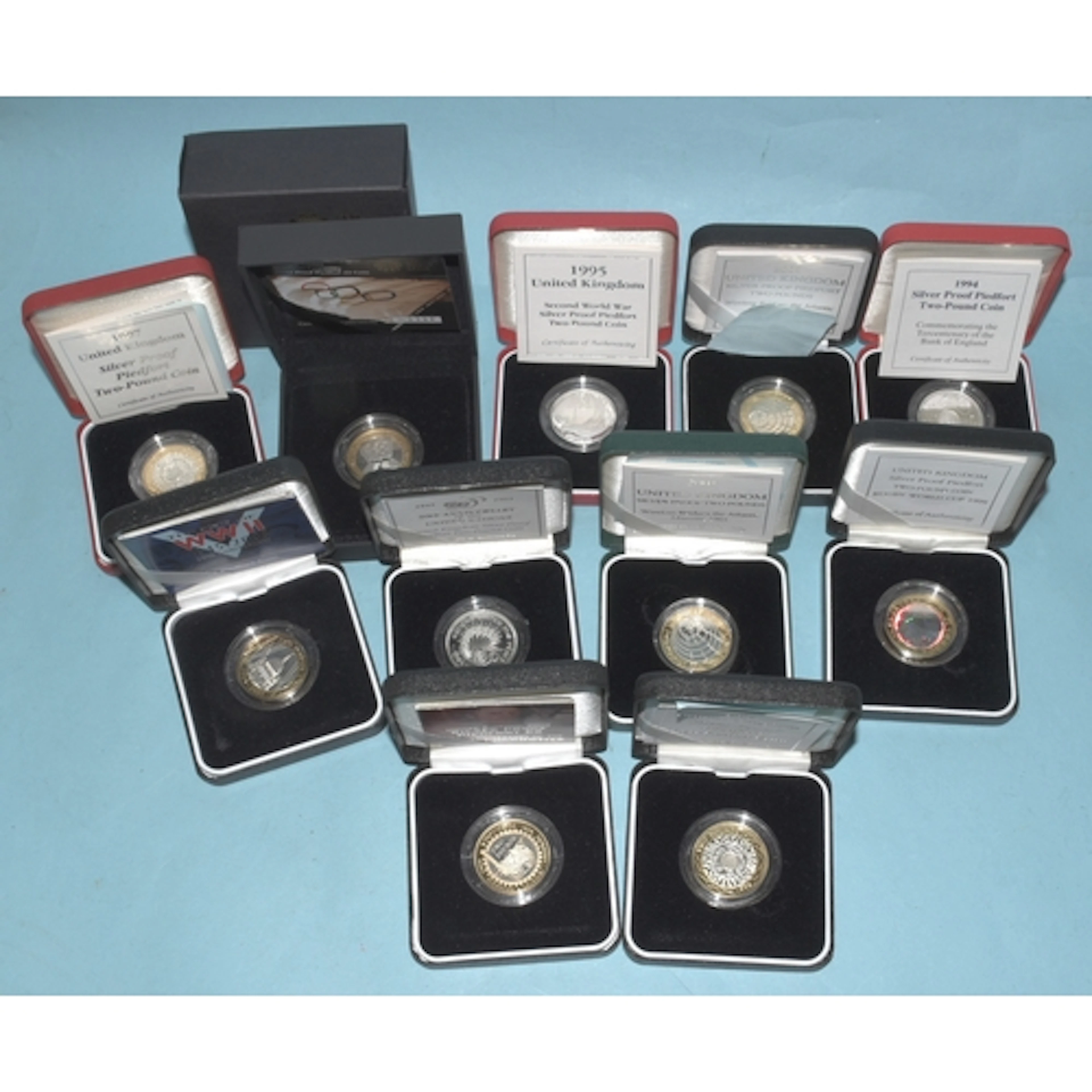 Royal Mint, a collection of eleven cased silver proof Piedfo...