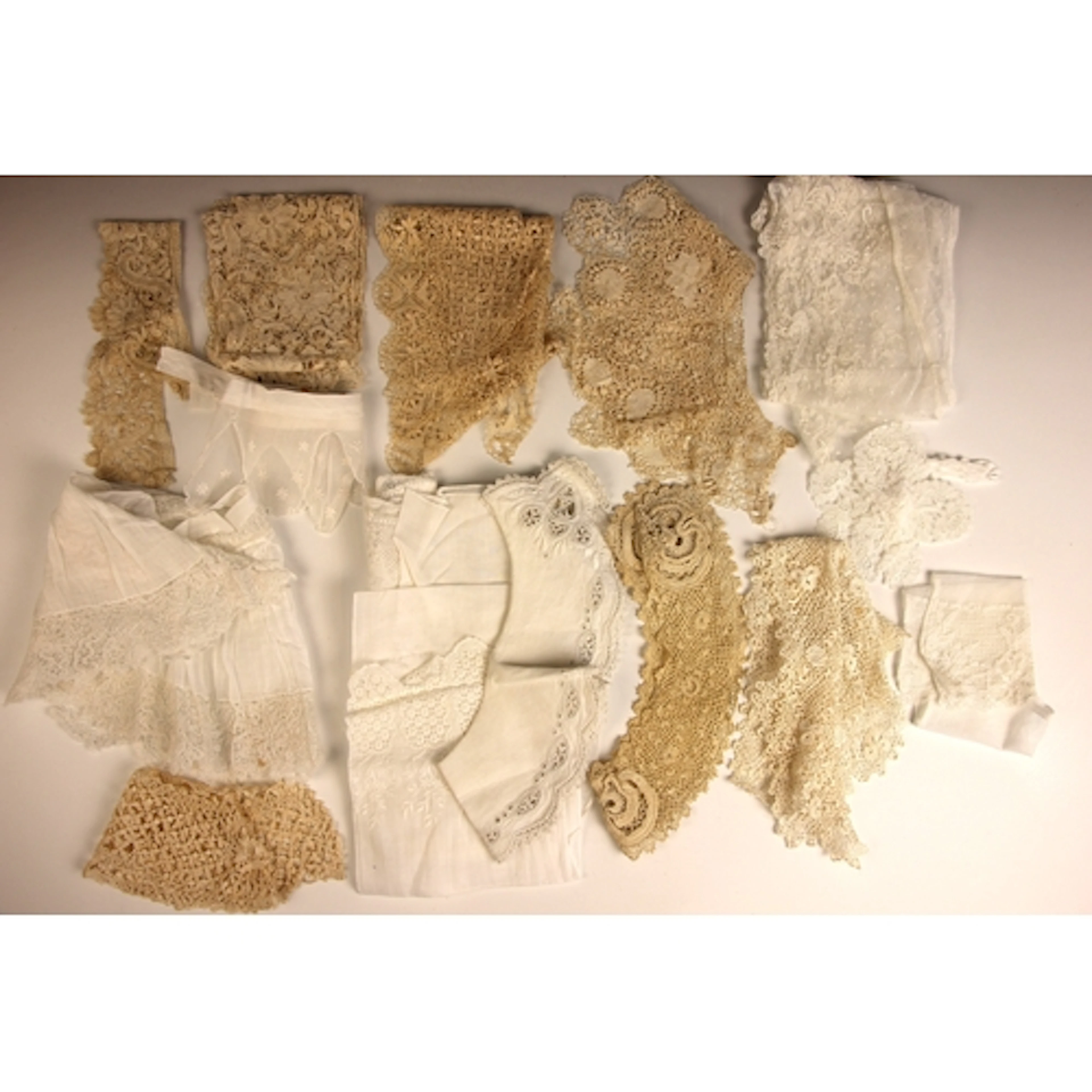 A late 19th century flounce of ecru net with tambour decorat...